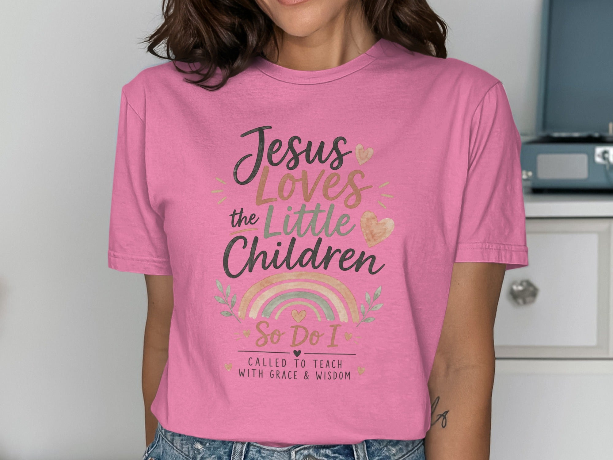 Pink t-shirt with "Jesus Loves the Little Children So Do I" text.