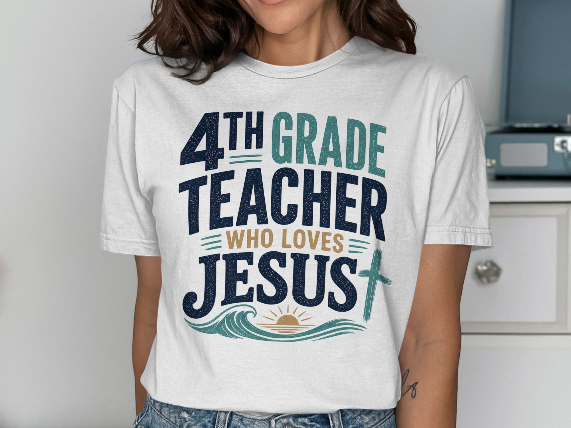 4th Grade Teacher Who Loves Jesus t-shirt with waves, sun, and cross design.