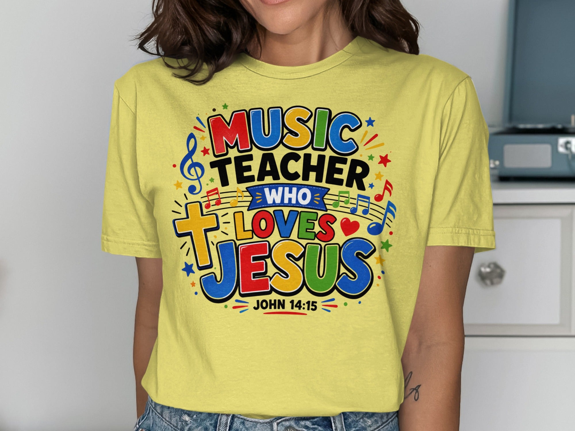 Yellow t-shirt with "Music Teacher Who Loves Jesus" and John 14:15.