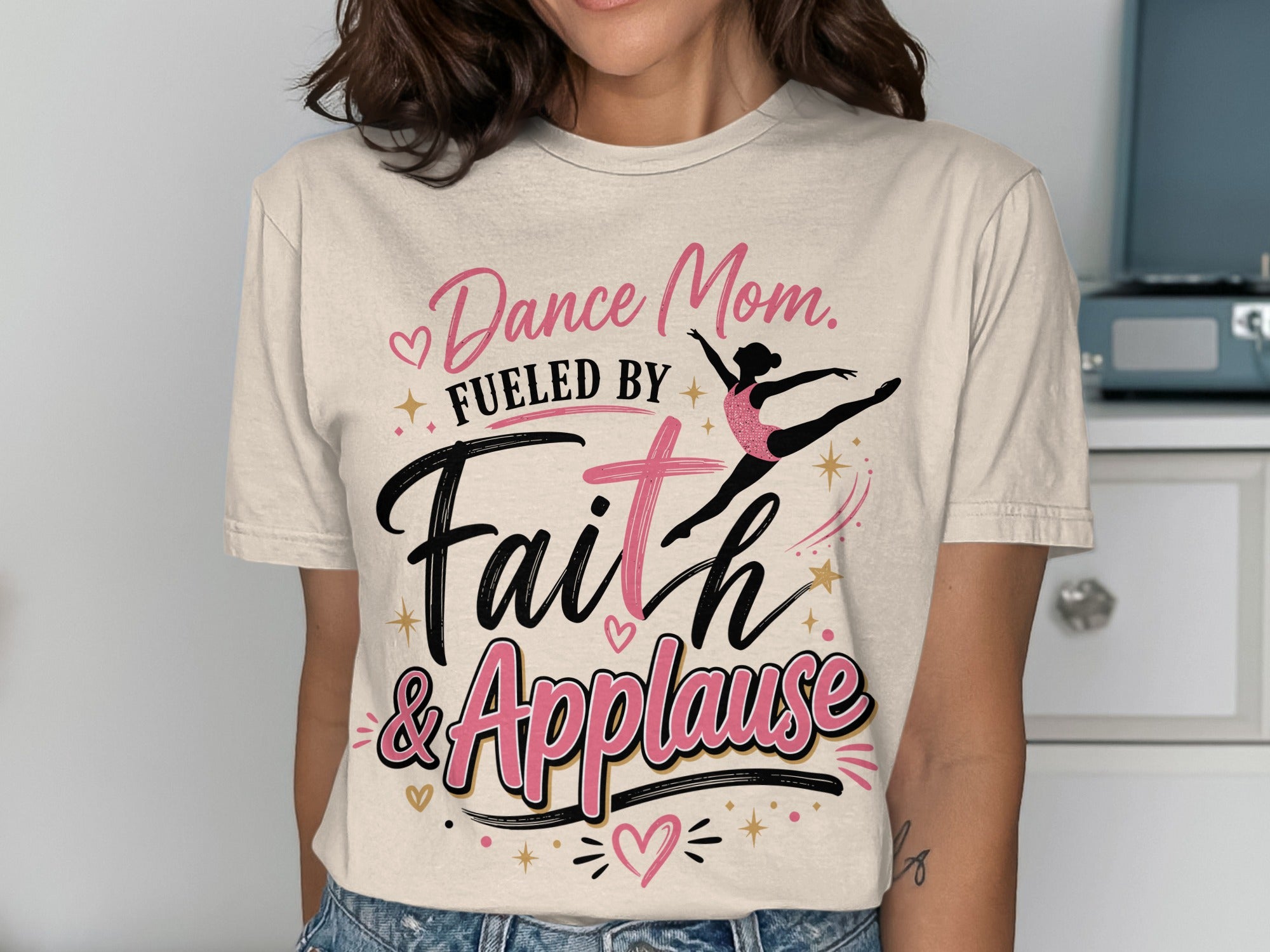 Cream t-shirt with "Dance Mom. Fueled by Faith & Applause" and a ballerina graphic.