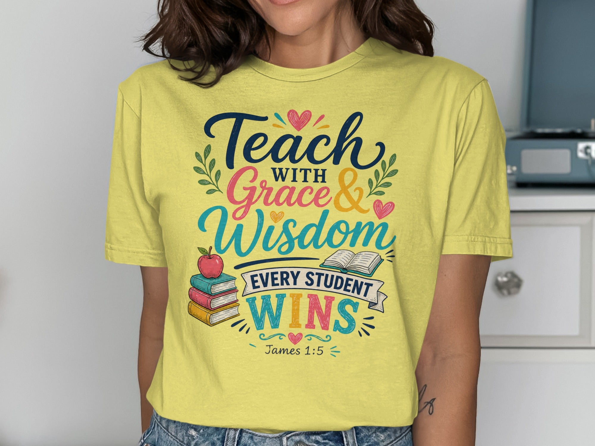 Yellow t-shirt with "Teach with Grace & Wisdom Every Student Wins" text.