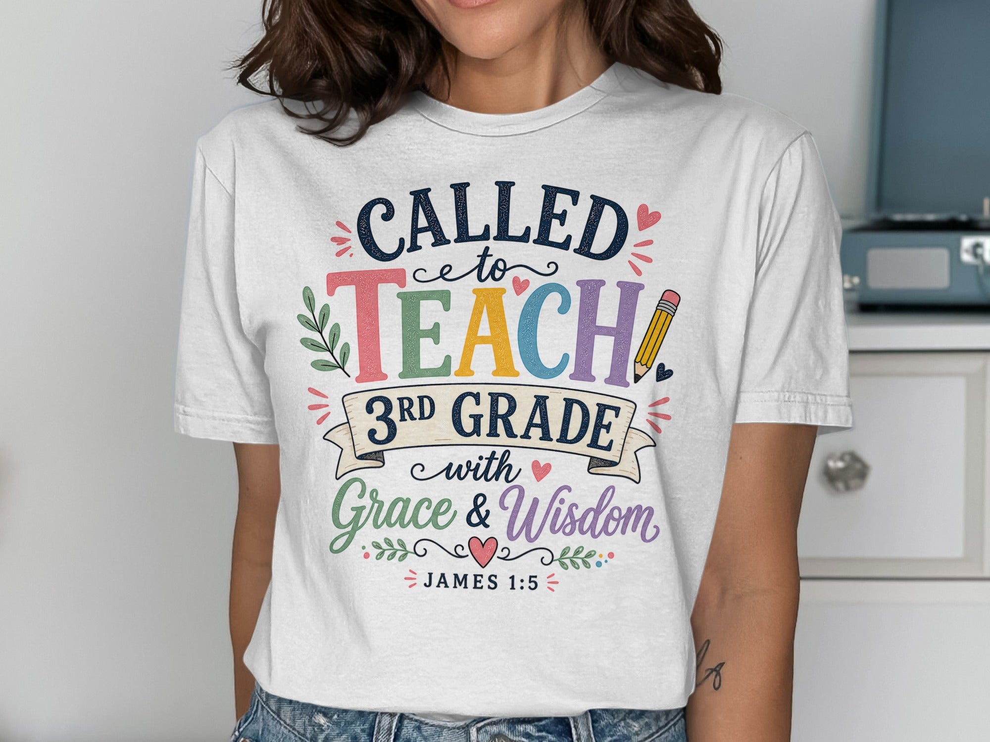T-shirt with "Called to Teach" and "3rd Grade" text in colorful lettering.