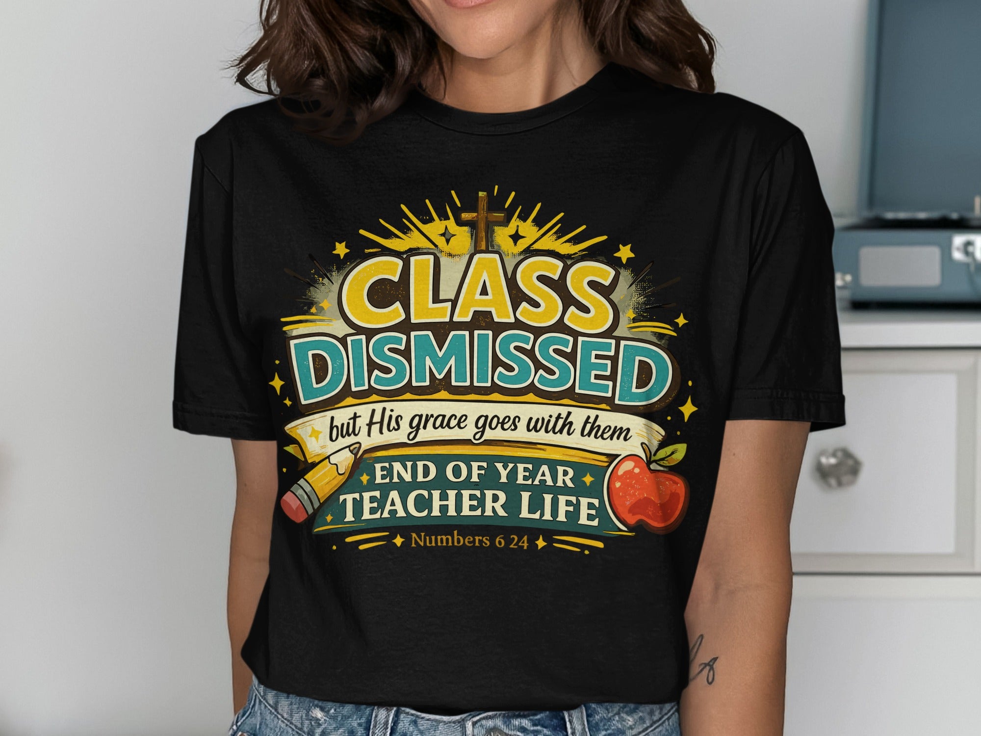 Black t-shirt with "CLASS DISMISSED but His grace goes with them" and teacher graphics.