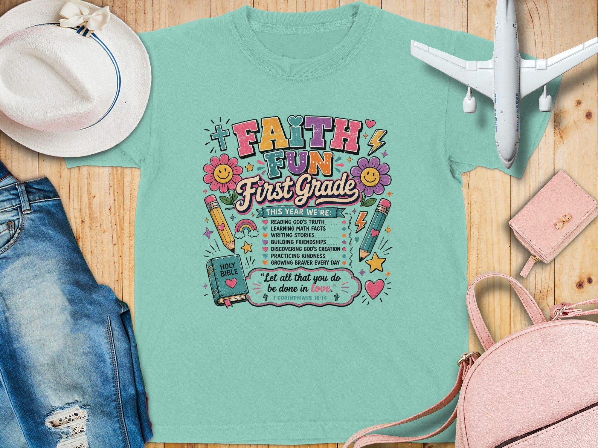 "Faith Fun First Grade" t-shirt with Bible verse and school activities.