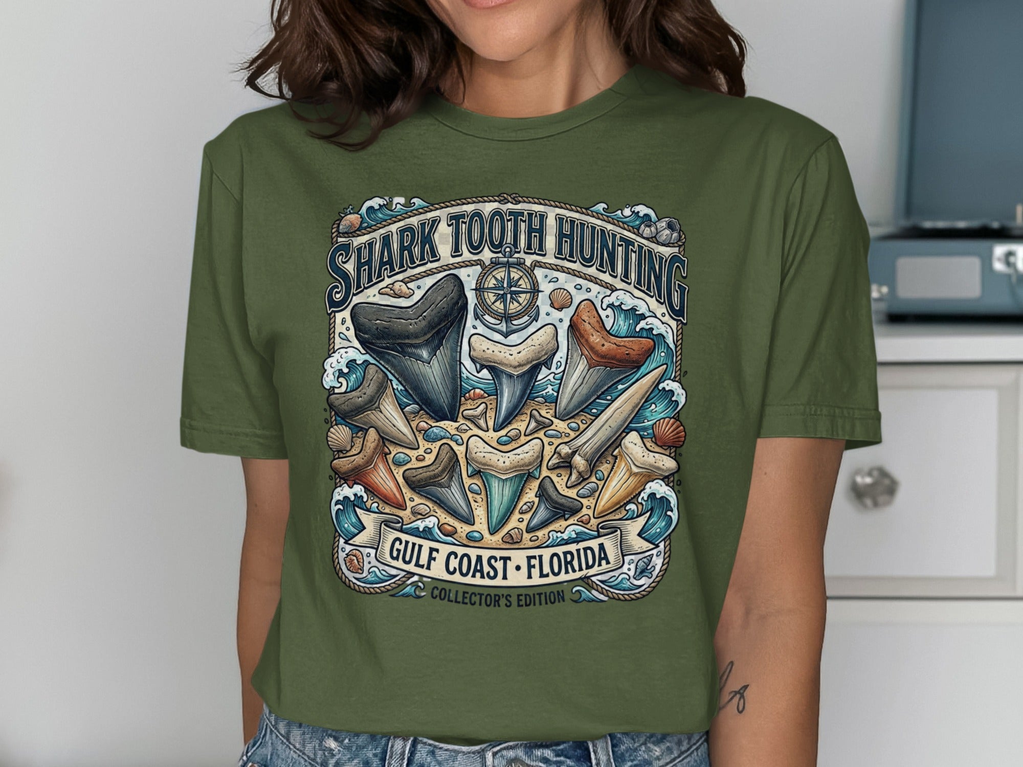 Shark Tooth Hunting Gulf Coast Florida Collector's Edition graphic on olive green shirt.