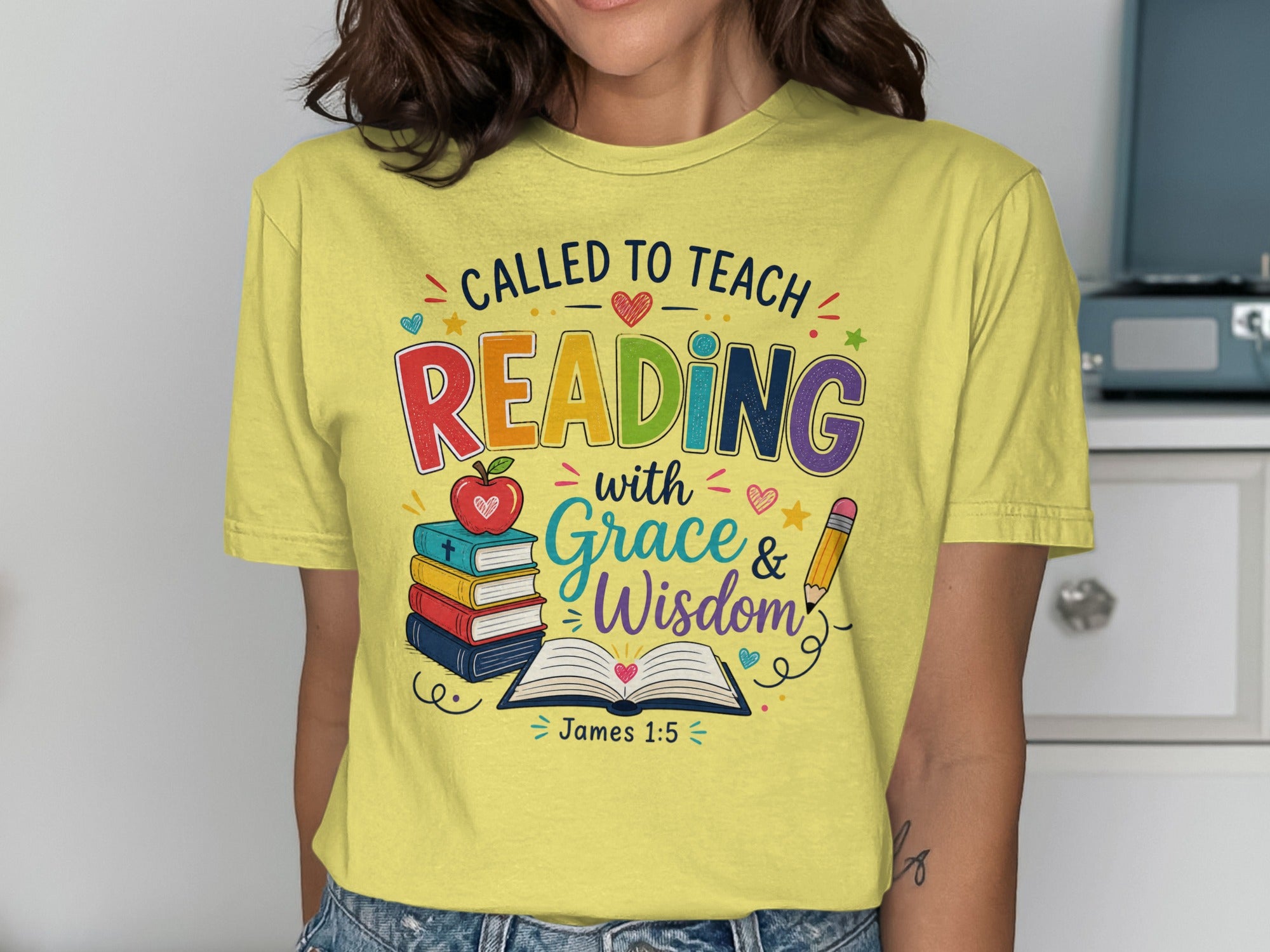 Yellow t-shirt with "Called to Teach Reading with Grace & Wisdom James 1:5" graphic.