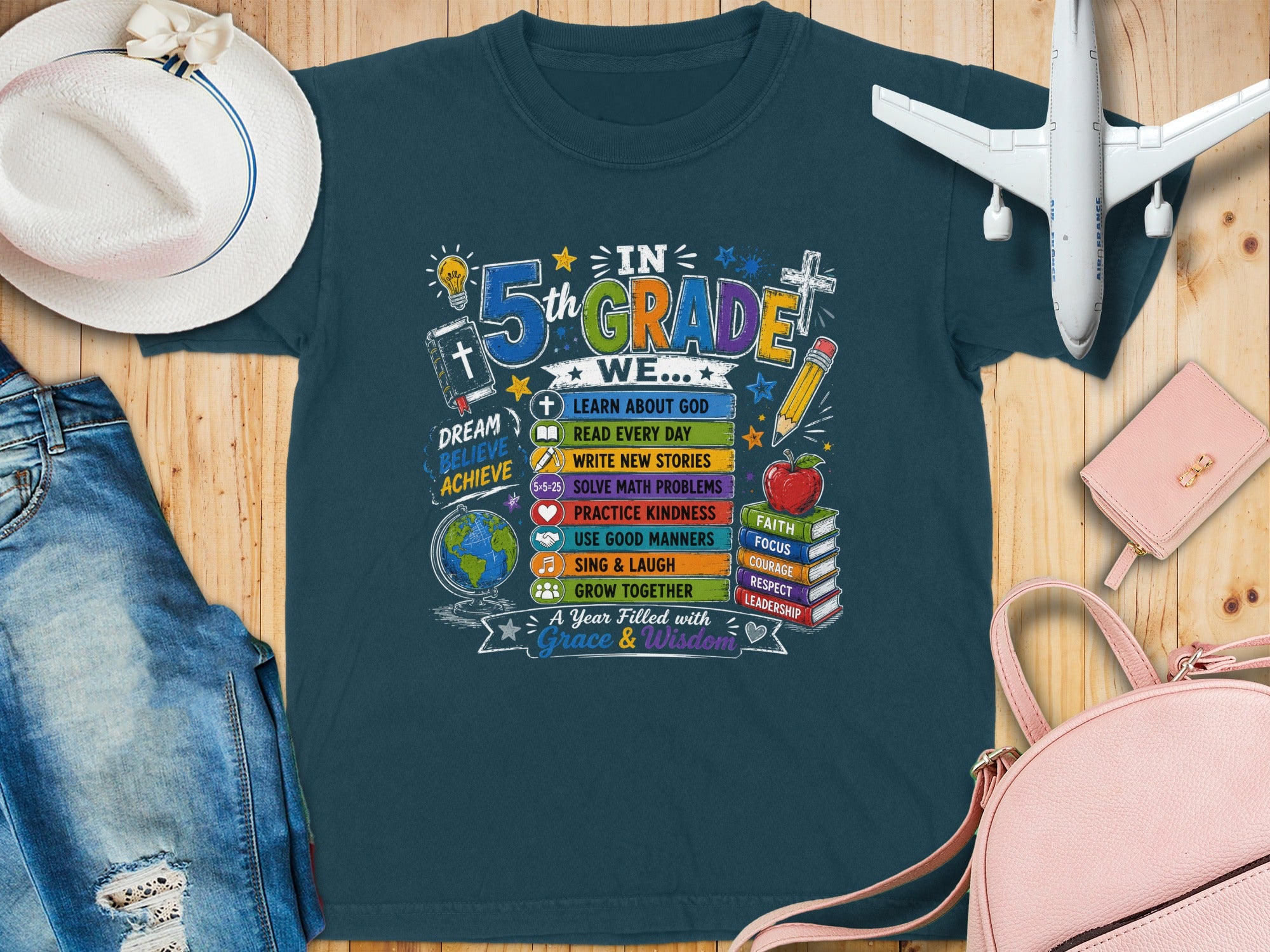 Dark blue t-shirt with "In 5th Grade" design, featuring school and inspirational words.