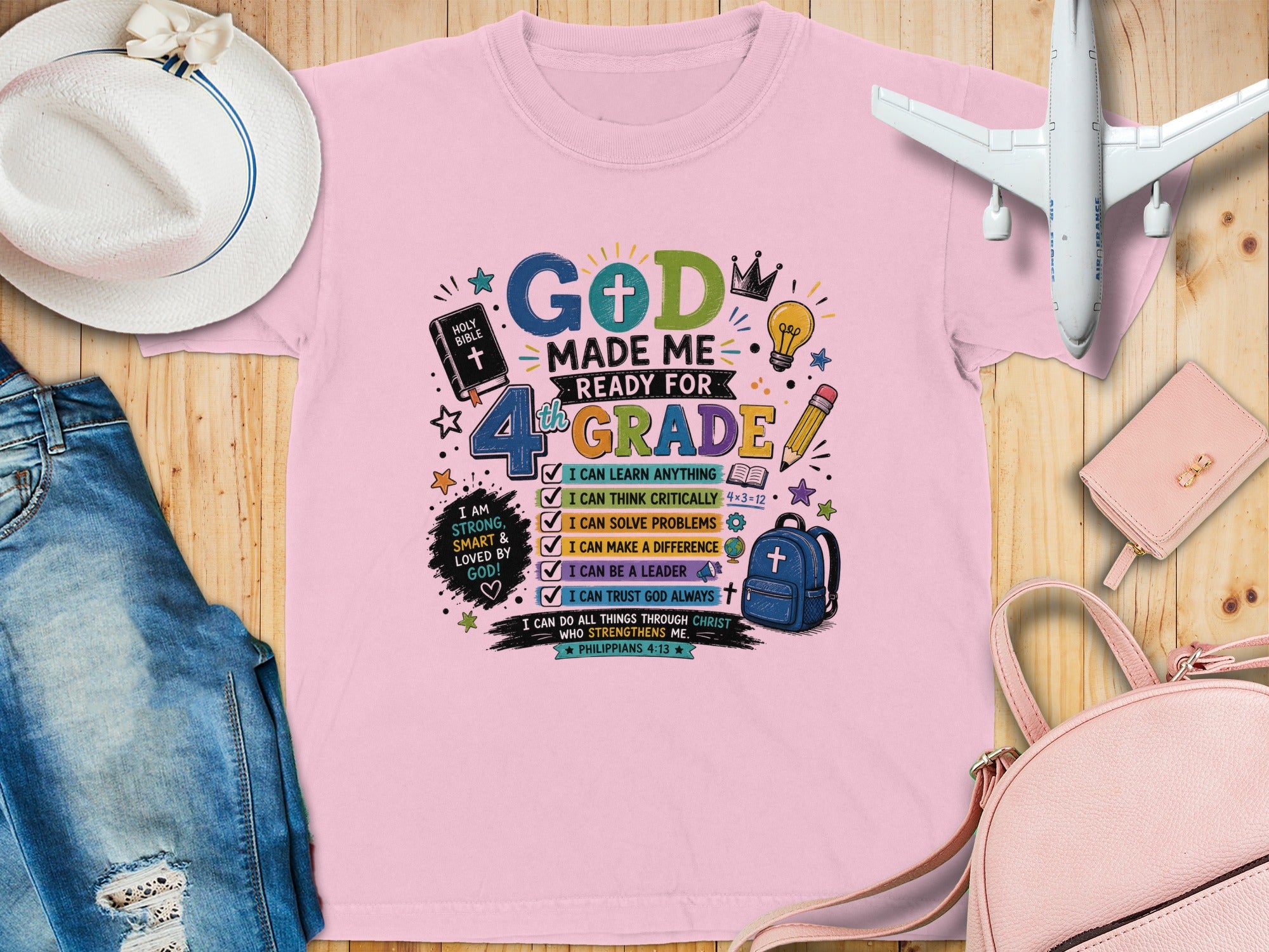 Pink t-shirt with "God Made Me Ready for 4th Grade" graphic and Bible verse.