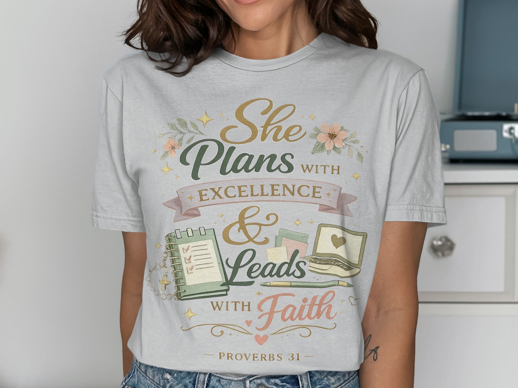 T-shirt with "She Plans with Excellence & Leads with Faith" text, Proverbs 31.