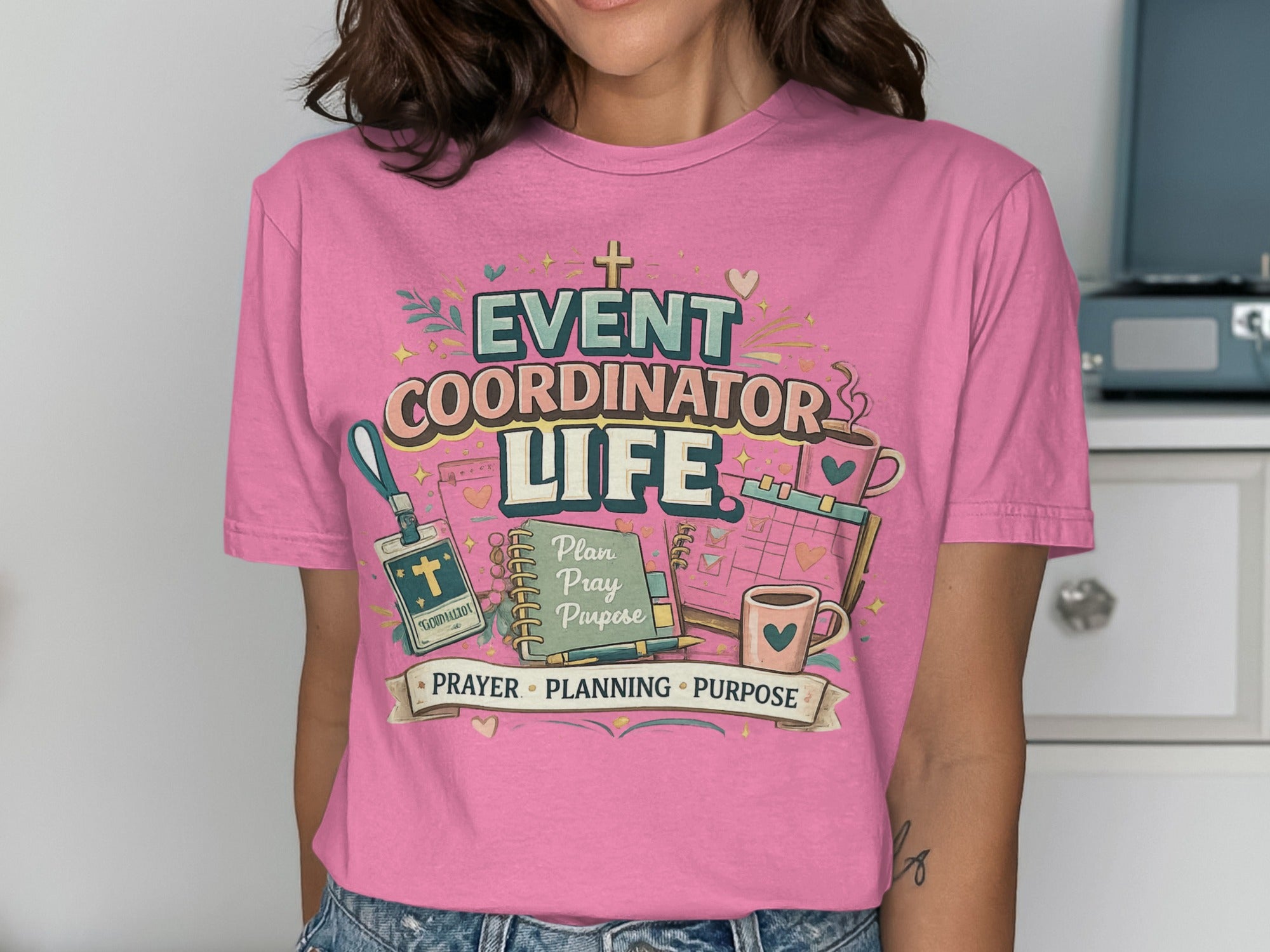 Pink t-shirt with "Event Coordinator Life" text and planner graphics.