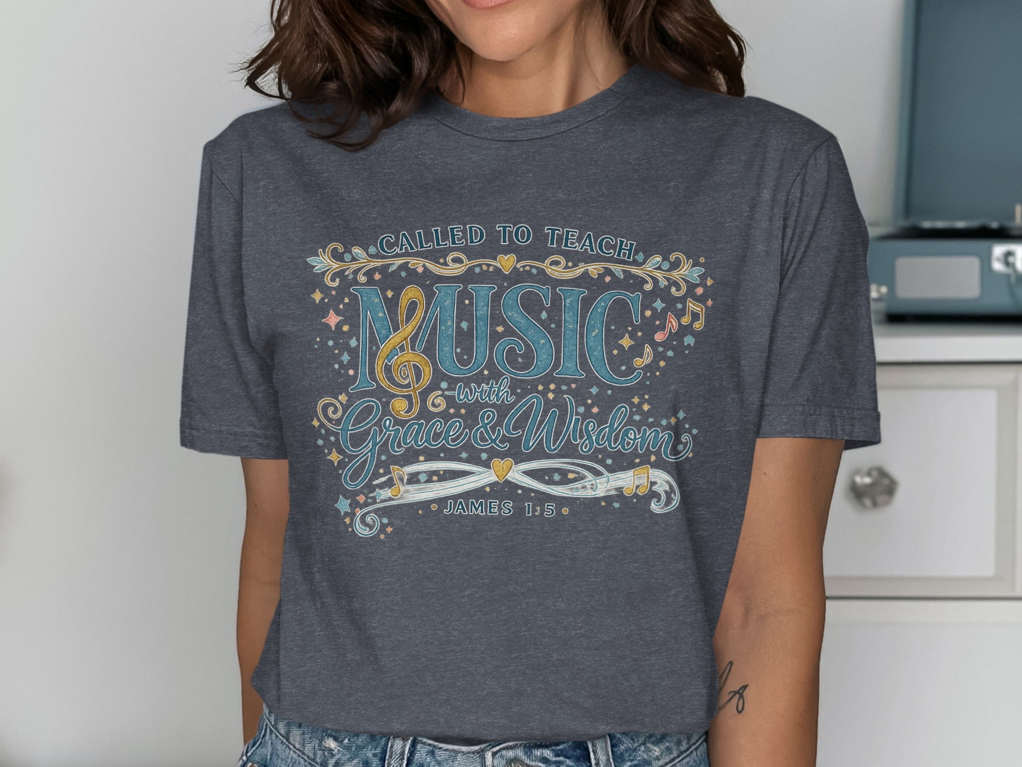 Dark gray t-shirt with "Called to Teach Music with Grace & Wisdom" and "James 1:5".