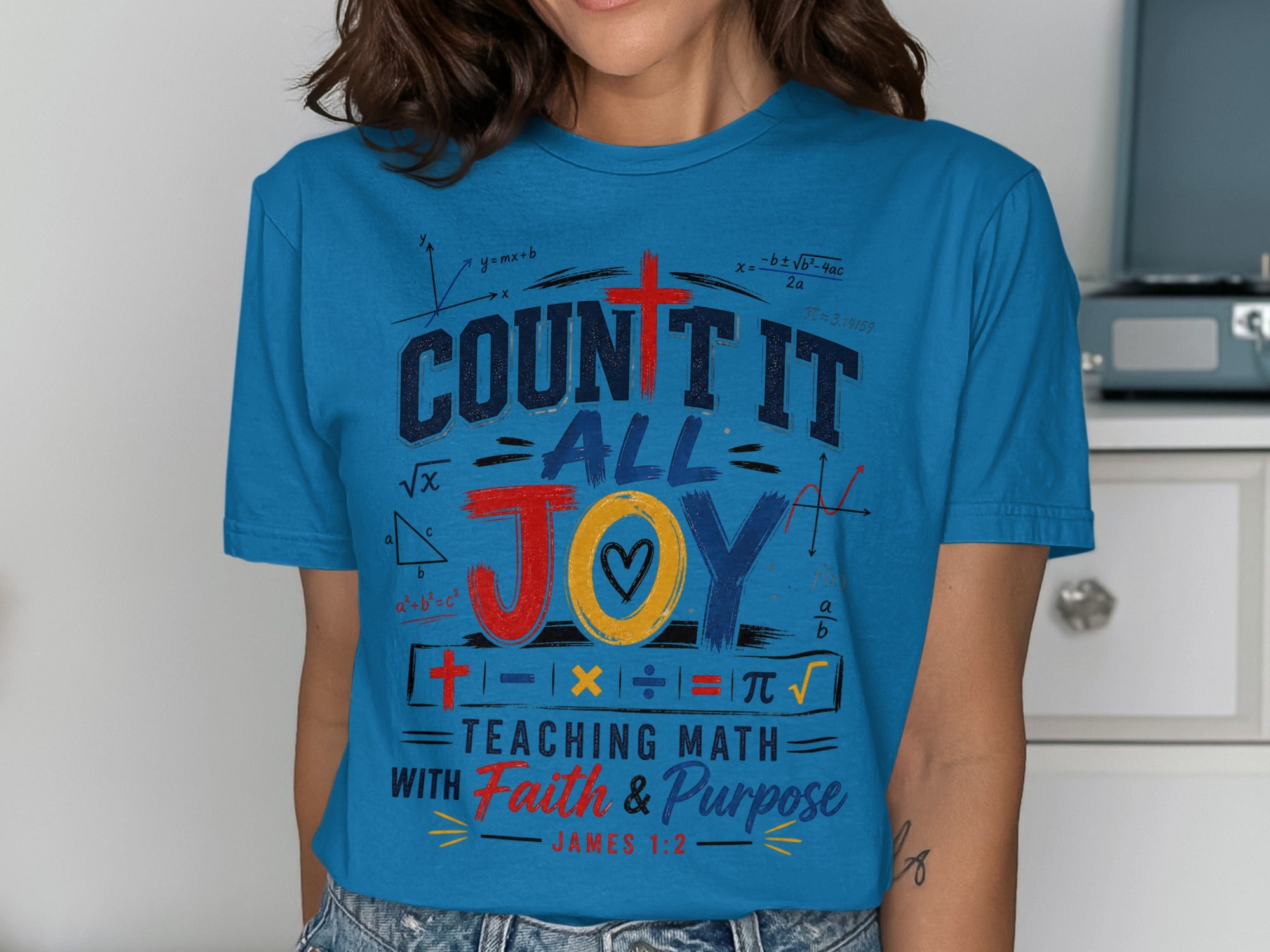 T-shirt with "COUNT IT ALL JOY TEACHING MATH WITH FAITH & PURPOSE" and math equations.