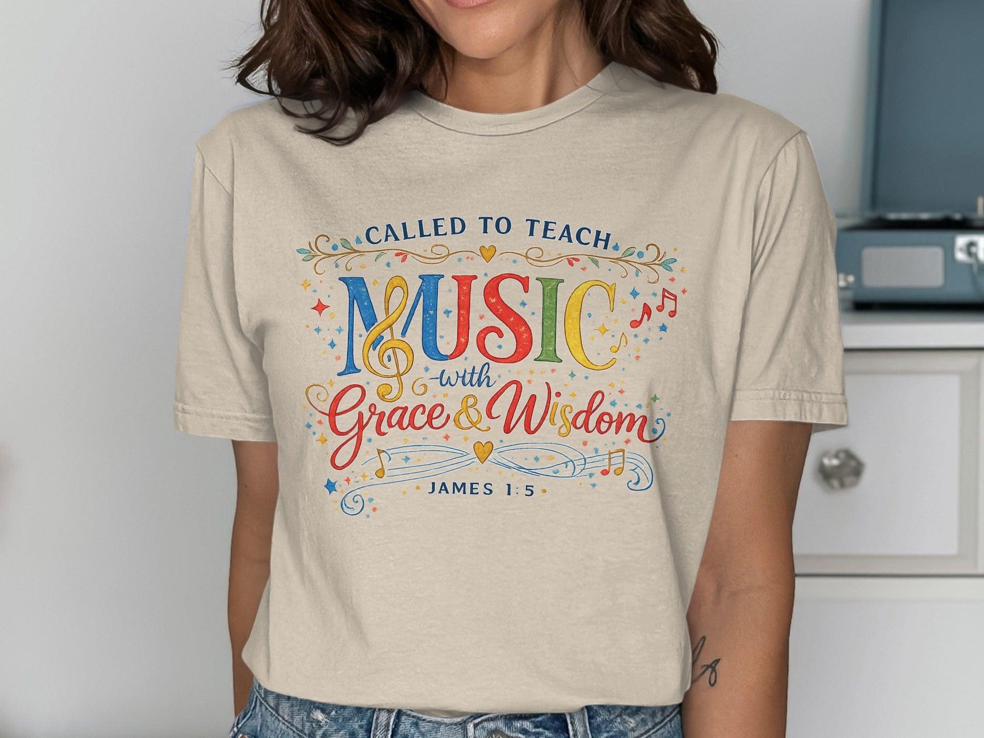 T-shirt with "Called to Teach Music with Grace & Wisdom" and James 1:5.