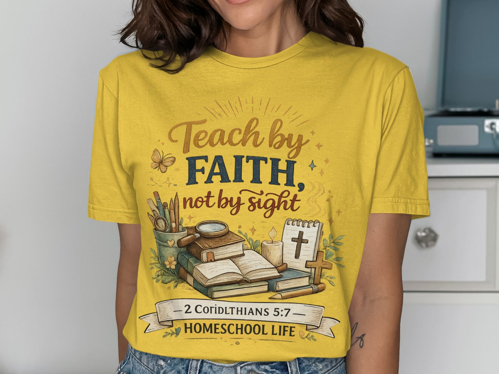 Yellow t-shirt with "Teach by Faith, Not by Sight" and Bible imagery.