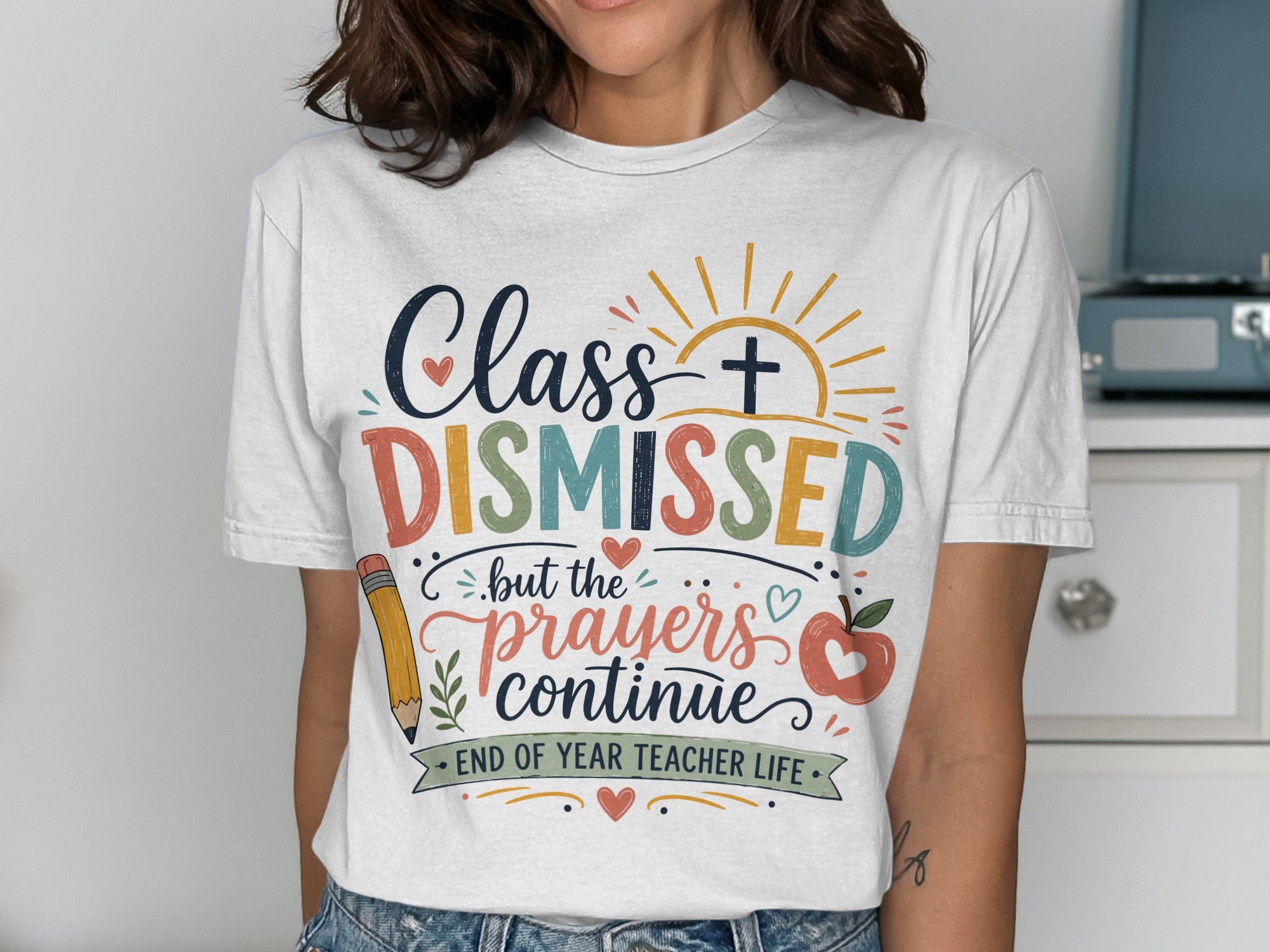Teacher shirt with "Class Dismissed but the prayers continue" and school icons.