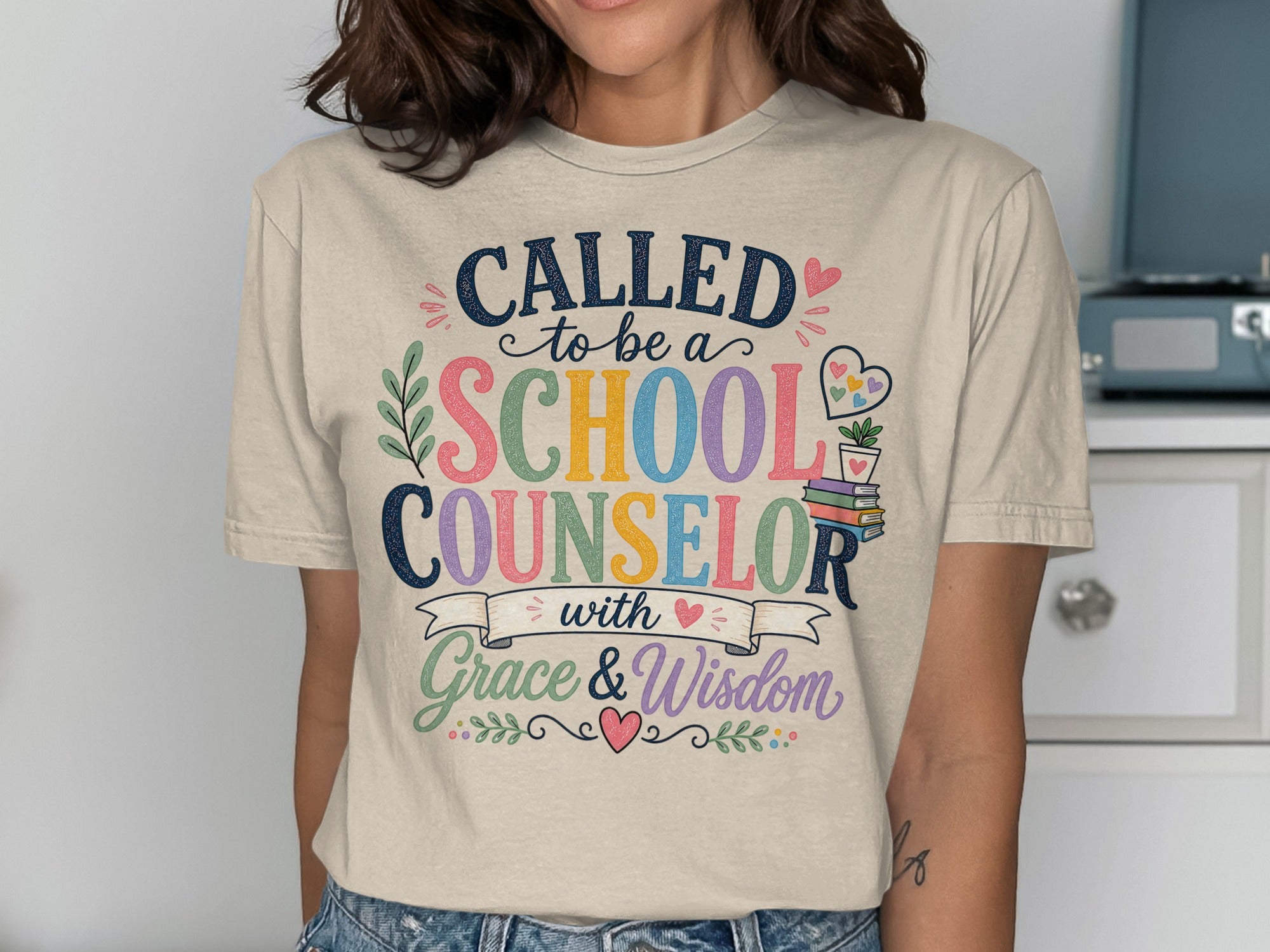 T-shirt with "Called to be a School Counselor with Grace & Wisdom" text.