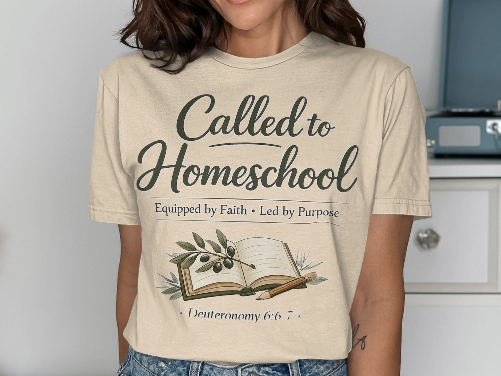 T-shirt with "Called to Homeschool" and scripture about faith and purpose.