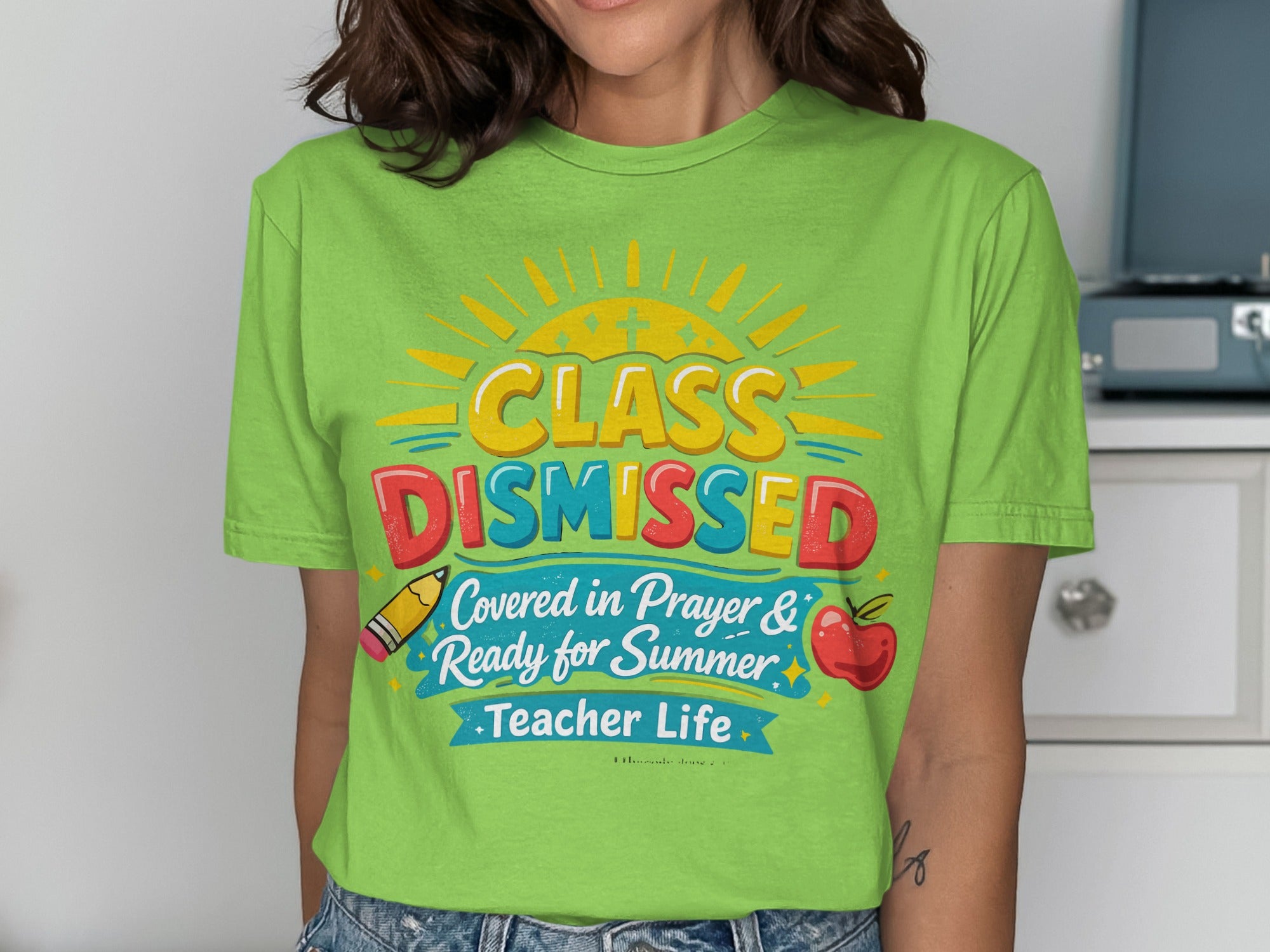 Lime green t-shirt with "Class Dismissed" and school supplies graphic.