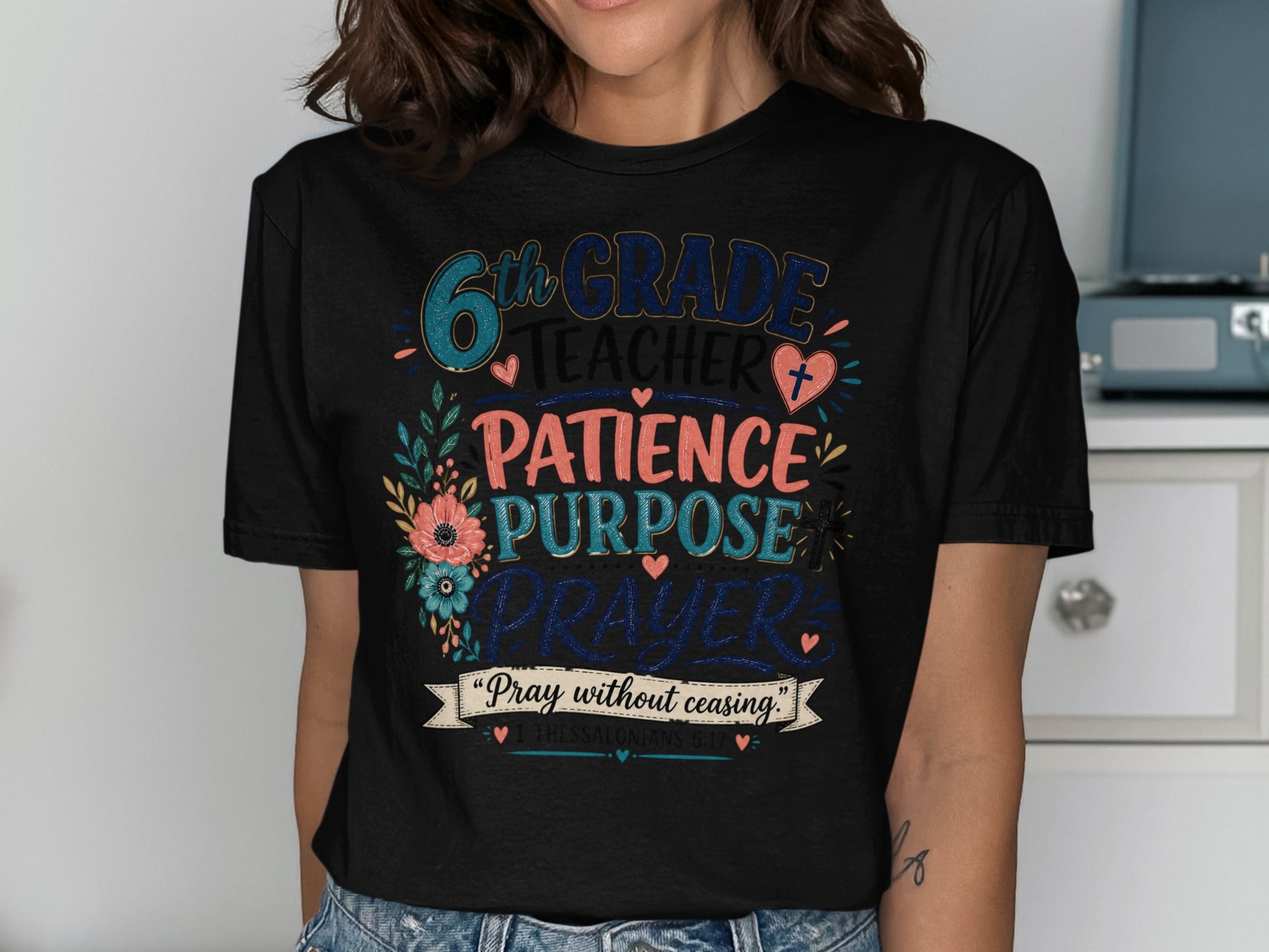 Black t-shirt with "6th Grade Teacher Patience Purpose Prayer" and Bible verse.