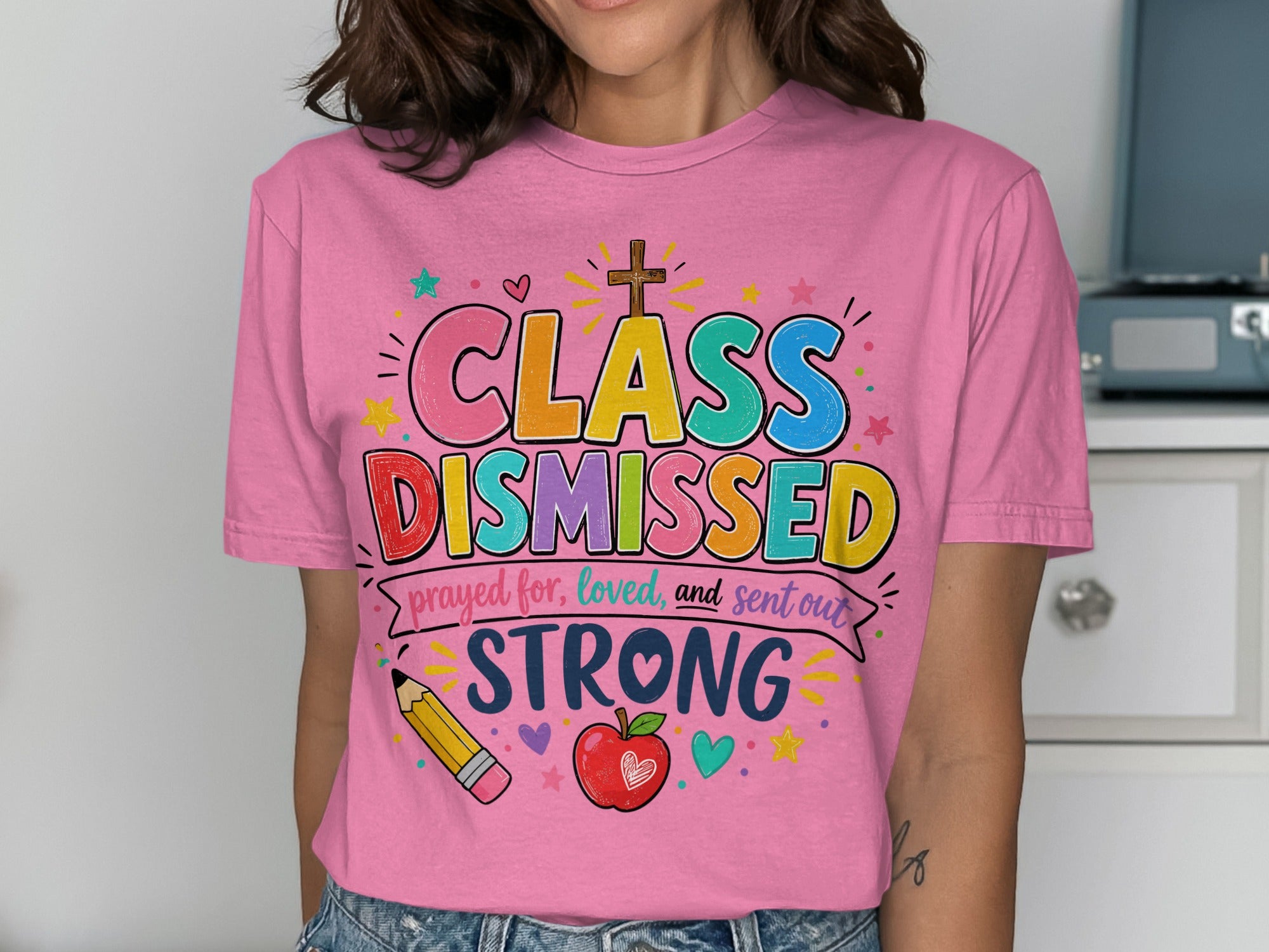 Pink t-shirt with "CLASS DISMISSED prayed for, loved, and sent out STRONG" text.