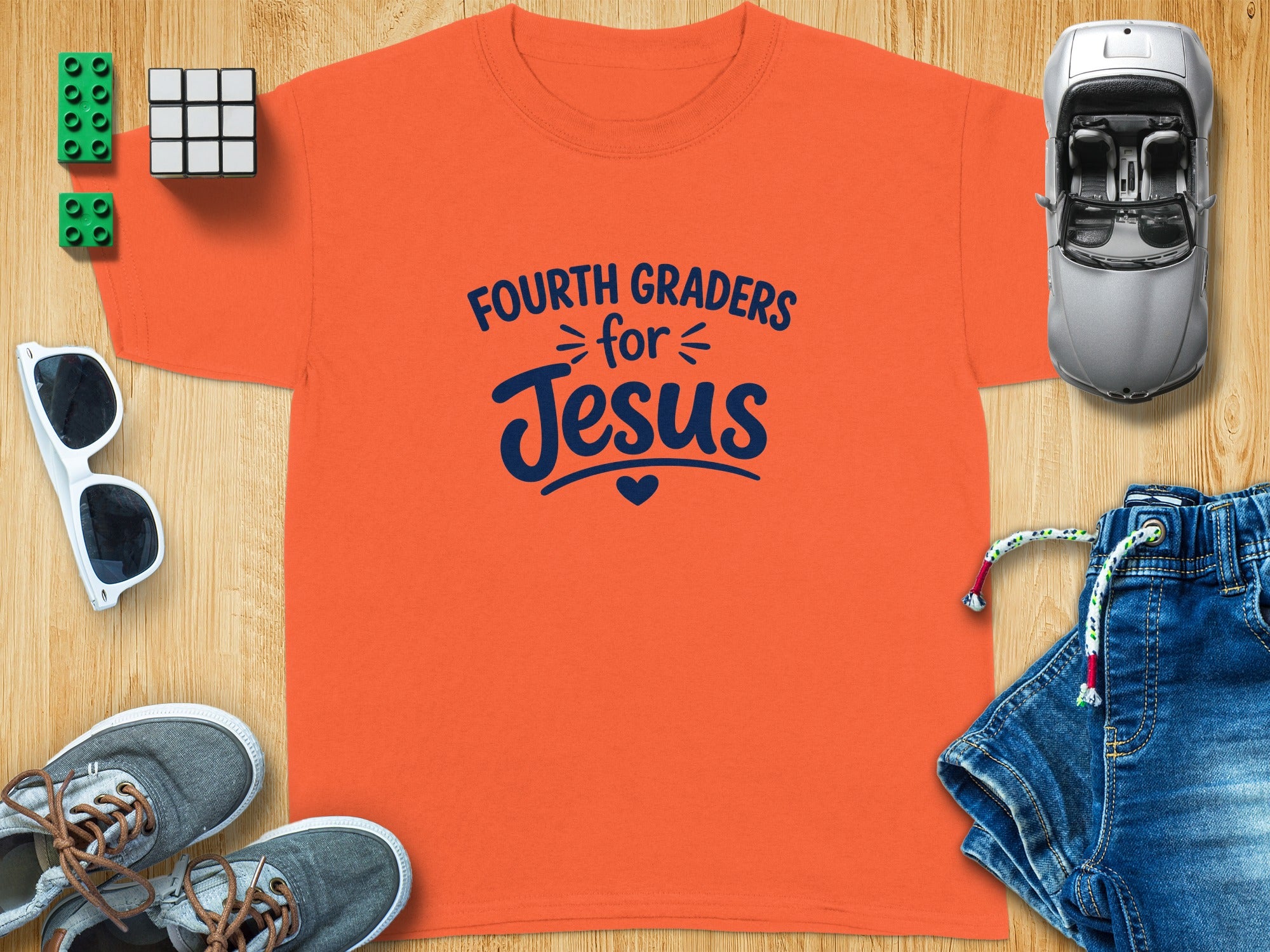 Orange t-shirt with "Fourth Graders for Jesus" text.