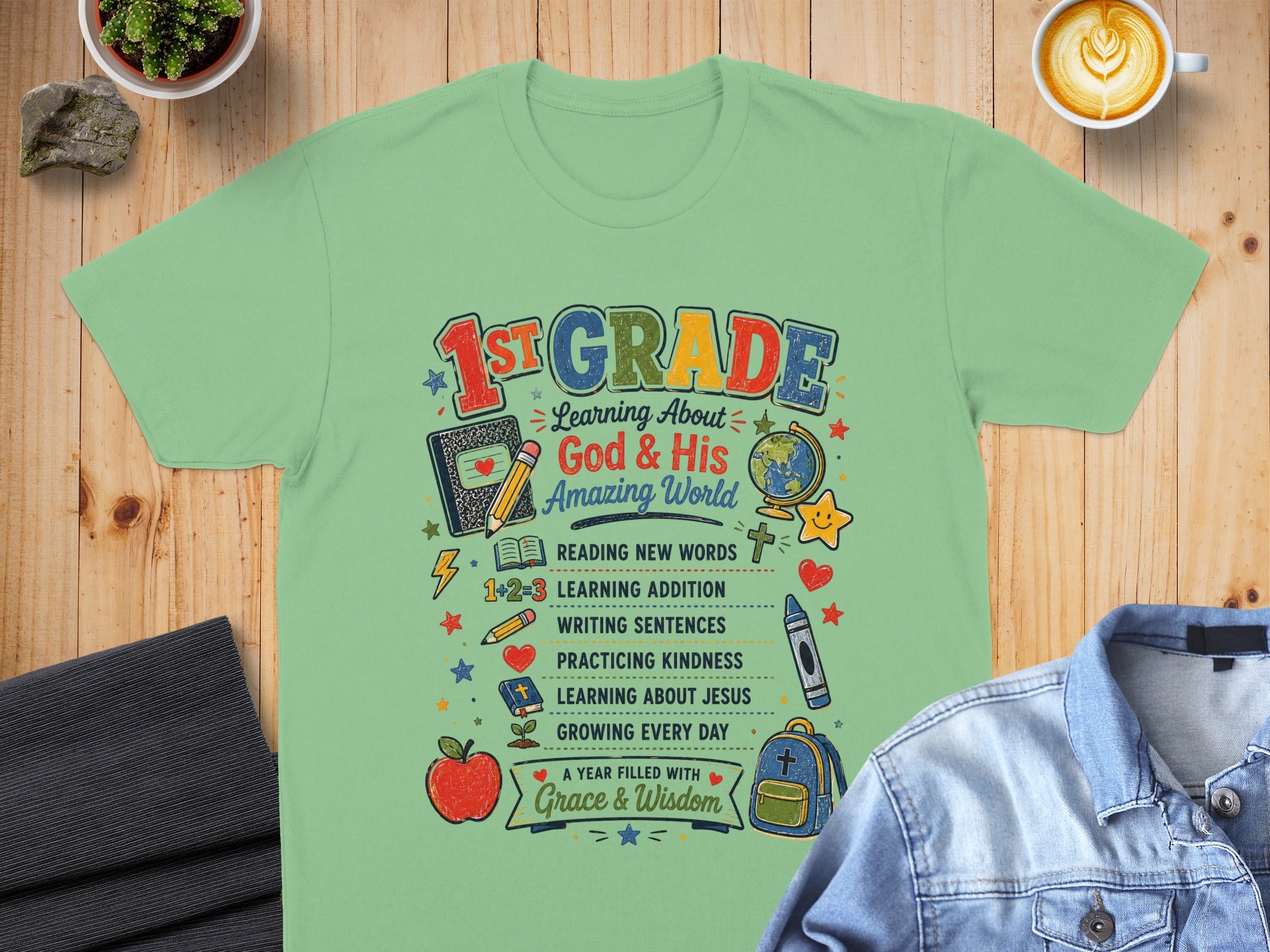 "1st Grade" t-shirt with colorful school-themed graphics and text about learning.