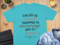 Teal t-shirt with "Called to Teach, Equipped to Encourage, Sent to Love" text.