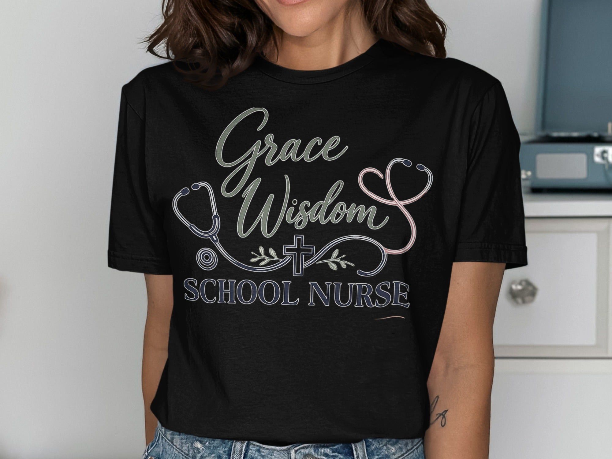 Black t-shirt with "Grace Wisdom School Nurse" text and stethoscope.
