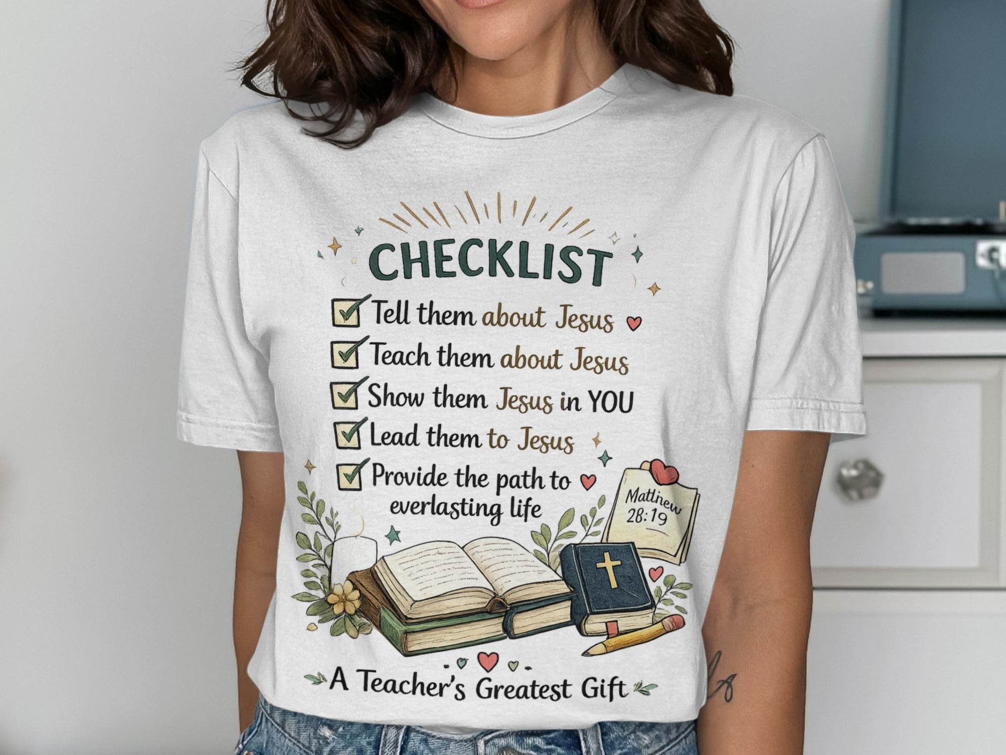 T-shirt with "CHECKLIST" of faith-based teachings and "A Teacher's Greatest Gift".