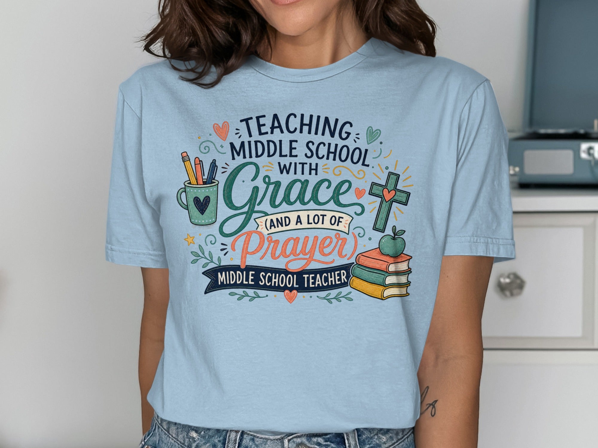 Light blue t-shirt with "Teaching Middle School with Grace and a Lot of Prayer" text.