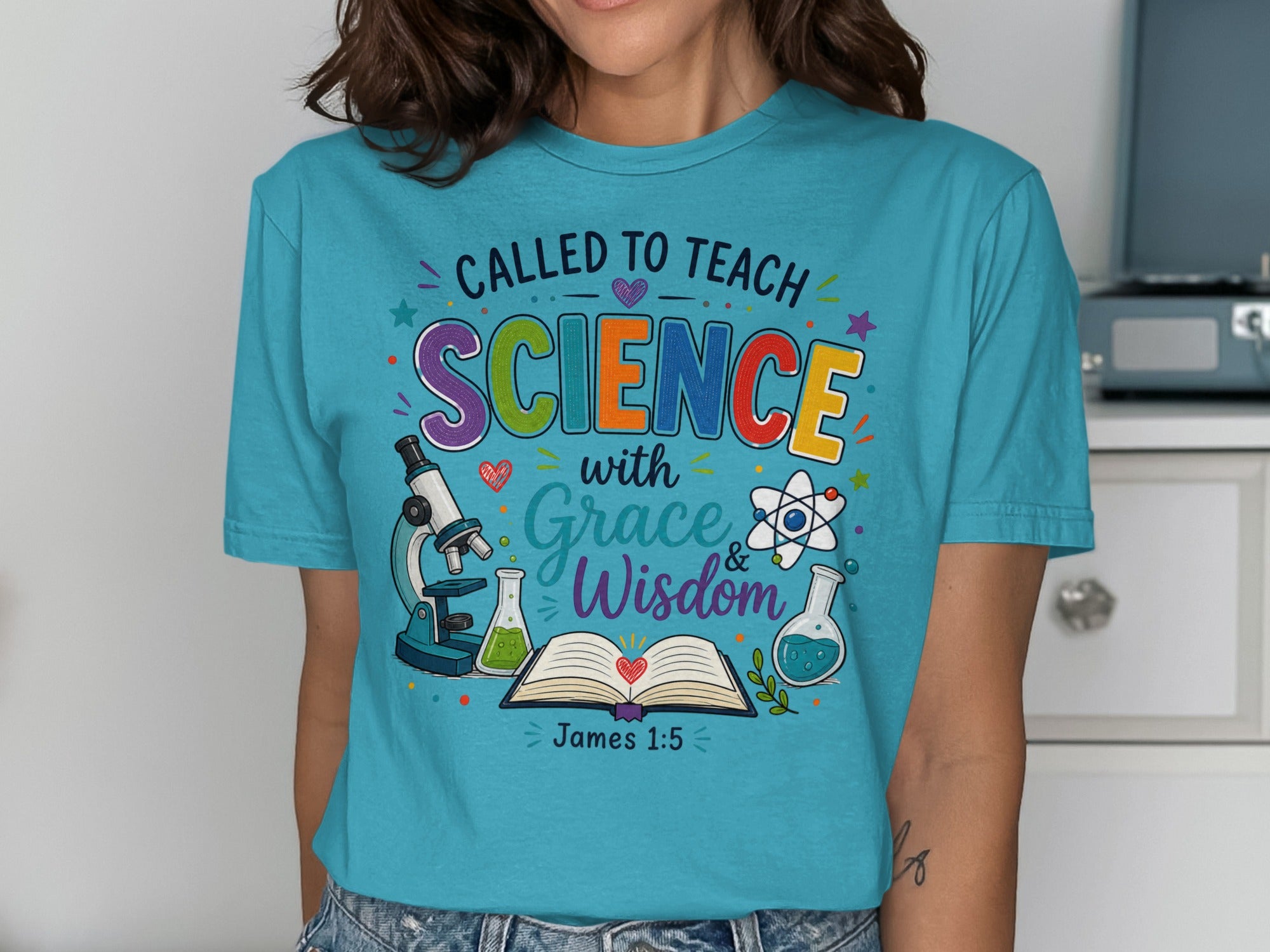 T-shirt with "Called to Teach Science with Grace & Wisdom" and science icons.