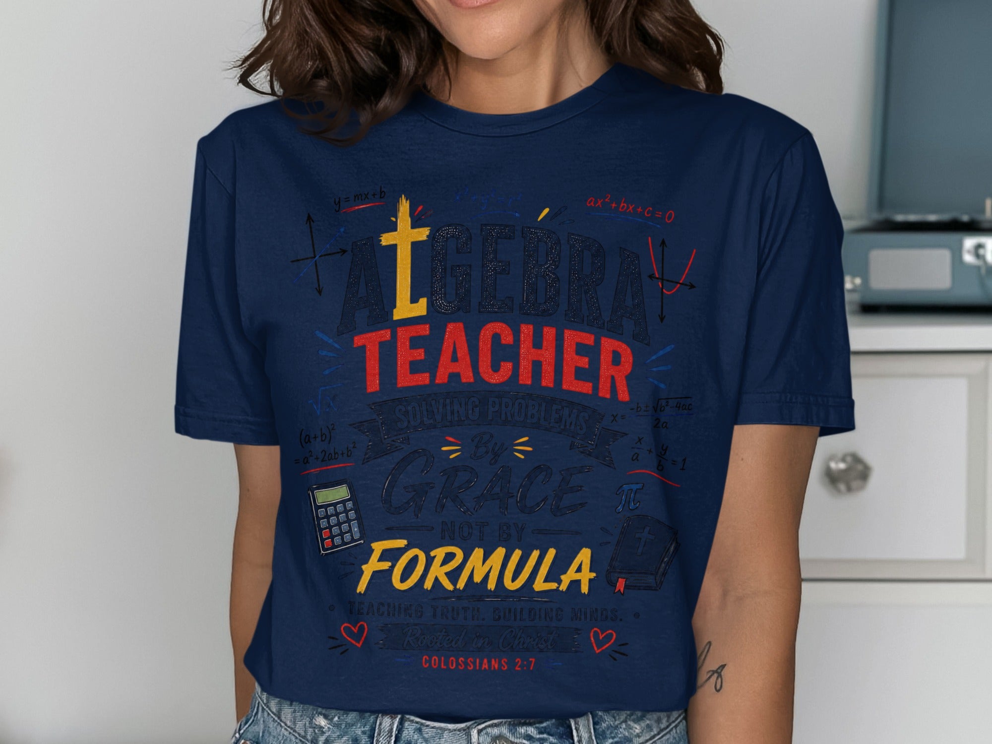 T-shirt with "Algebra Teacher Solving Problems By Grace Not By Formula" text.