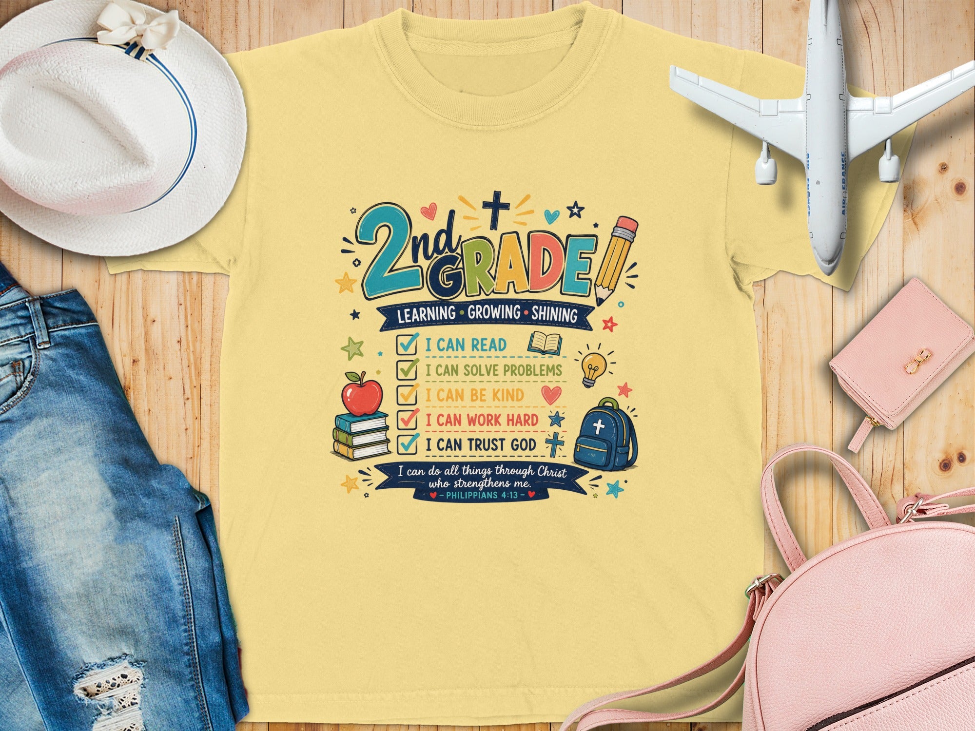 Yellow t-shirt with "2nd Grade" and a list of positive affirmations.