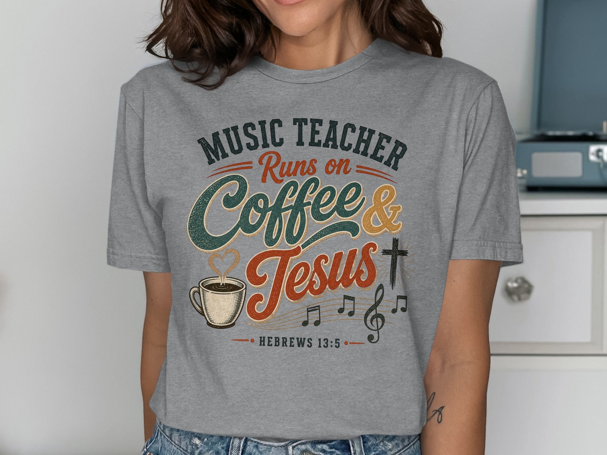 Gray t-shirt with "Music Teacher Runs on Coffee & Jesus" text and musical notes.
