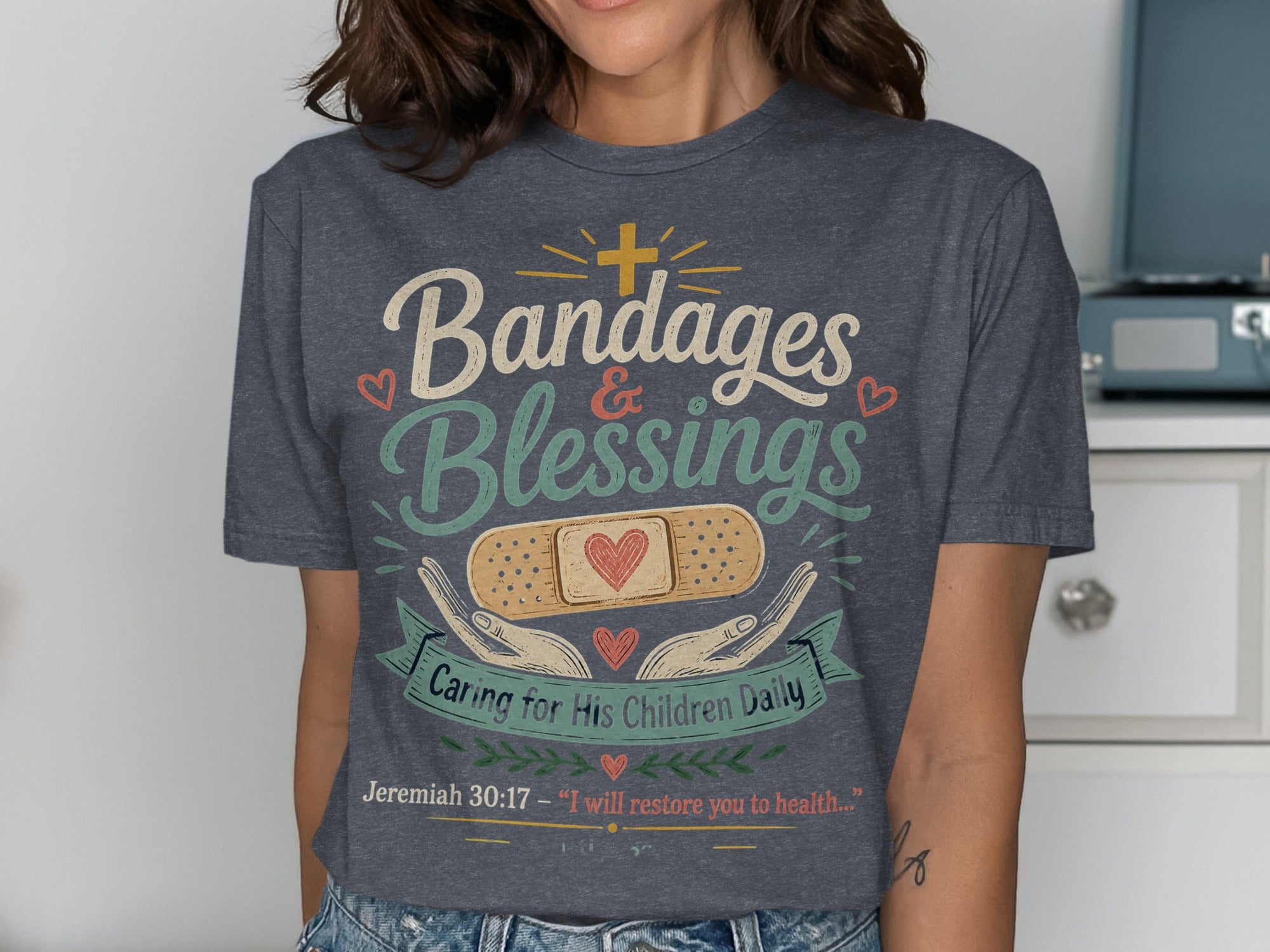 T-shirt with "Bandages & Blessings" and Bible verse Jeremiah 30:17.