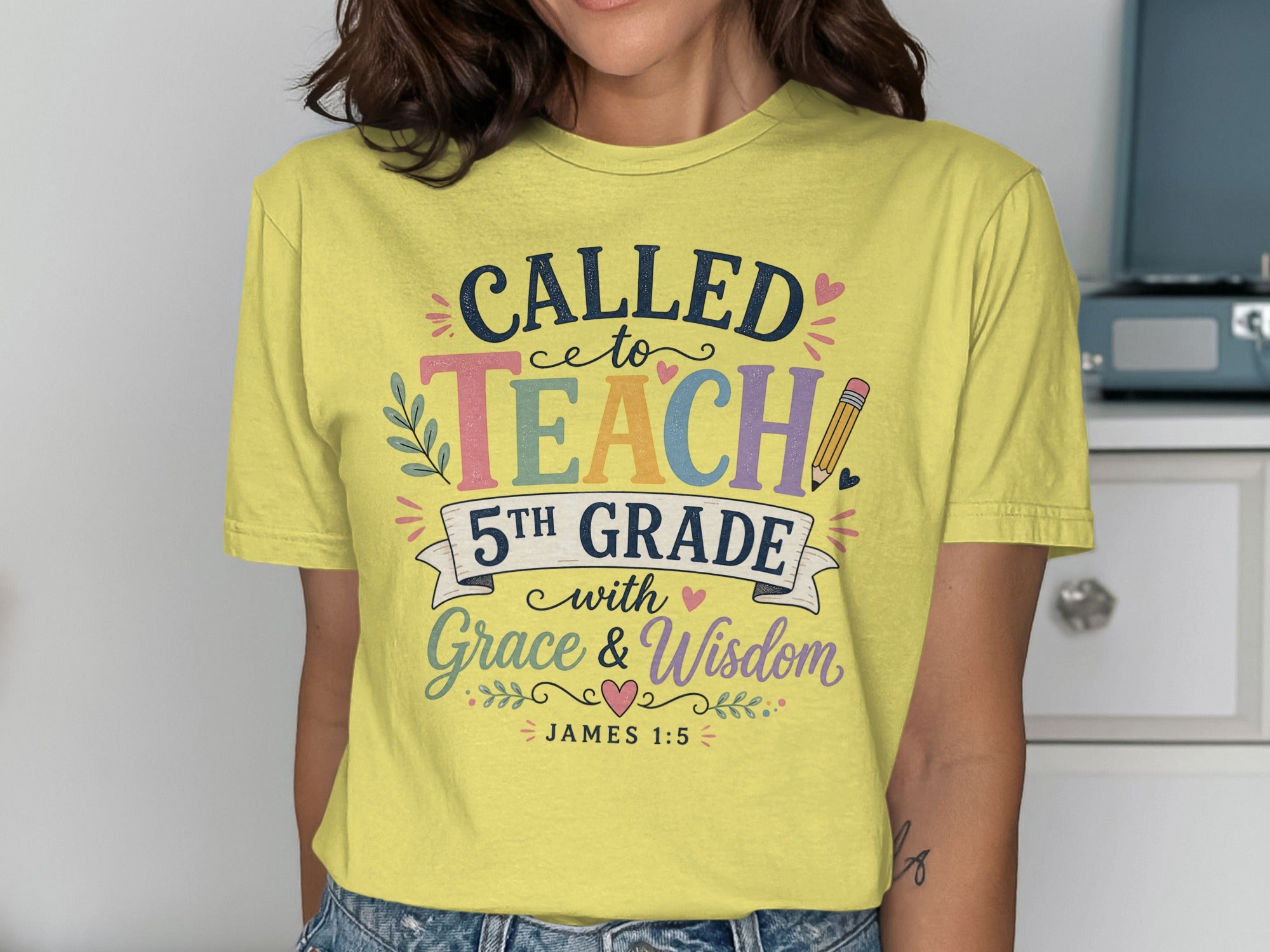 Yellow t-shirt with "Called to Teach 5th Grade with Grace & Wisdom" text.