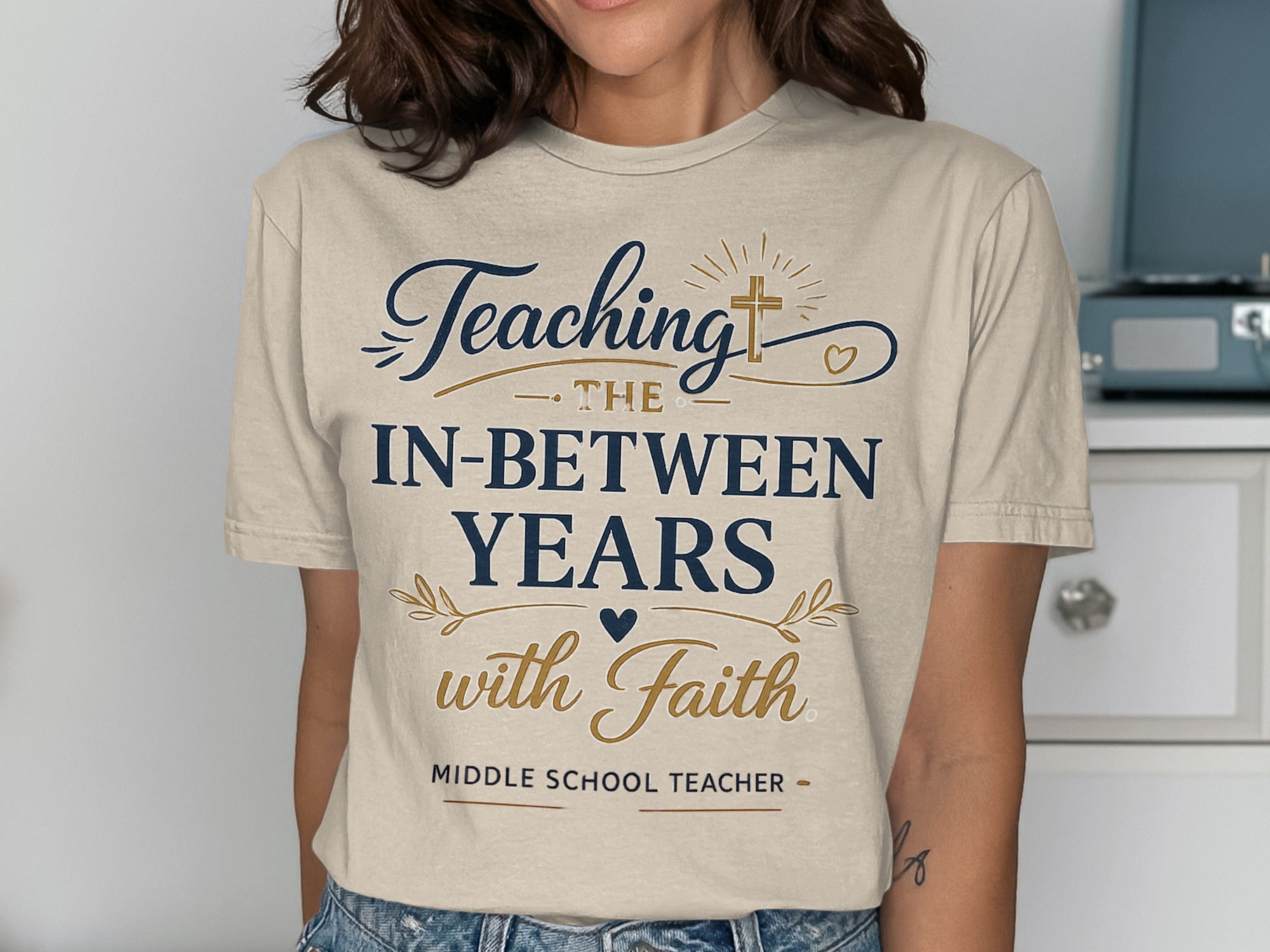 "Teaching the in-between years with faith" middle school teacher t-shirt.