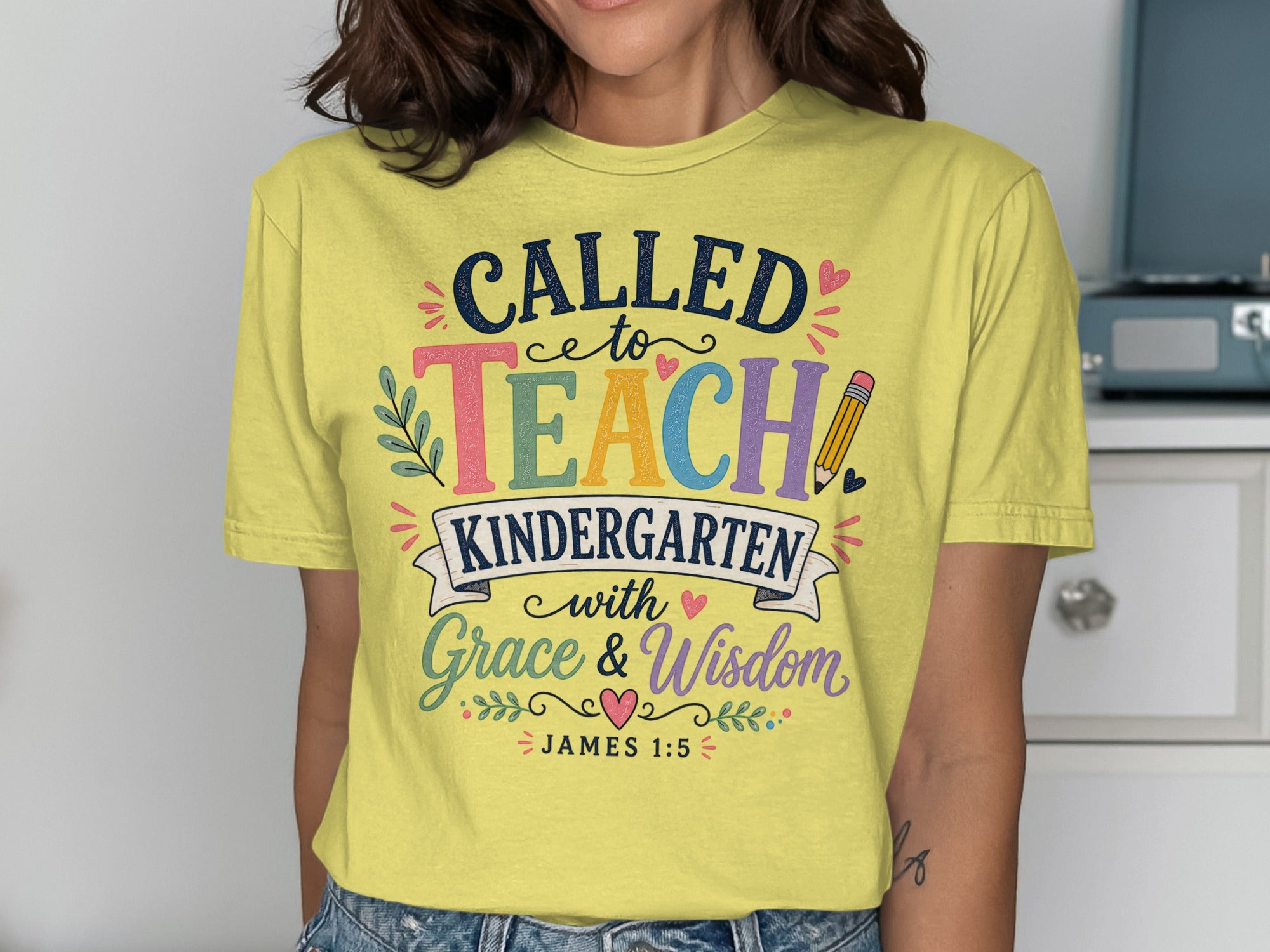 Yellow t-shirt with "Called to Teach Kindergarten with Grace & Wisdom" and Bible verse.