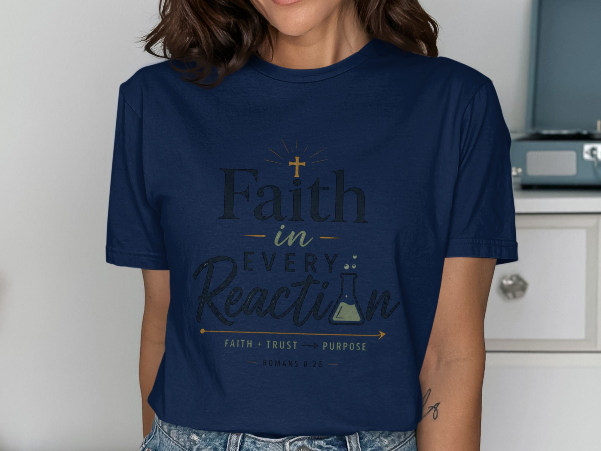 Navy t-shirt with "Faith in Every Reaction" text and a chemical beaker.