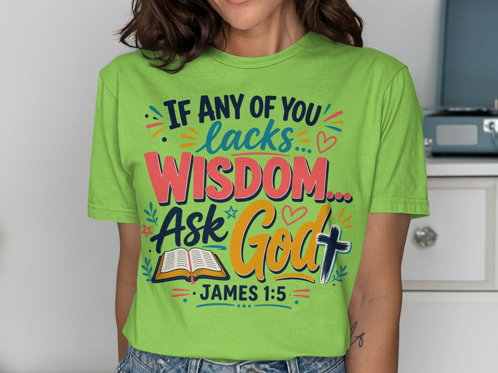 Green t-shirt with "If any of you lacks wisdom... Ask God" and "James 1:5".