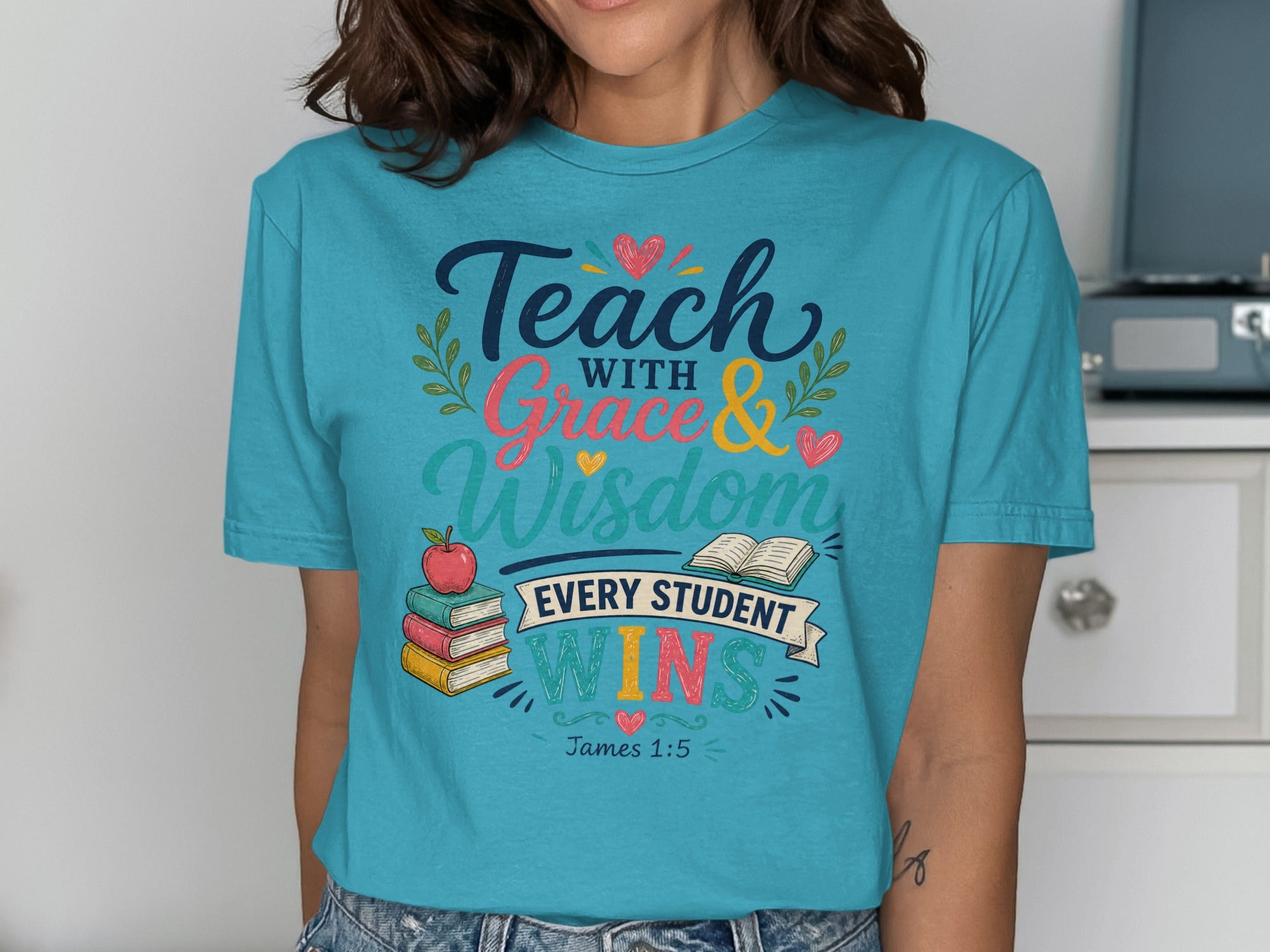 Teal t-shirt with "Teach with Grace & Wisdom Every Student Wins" and Bible verse.