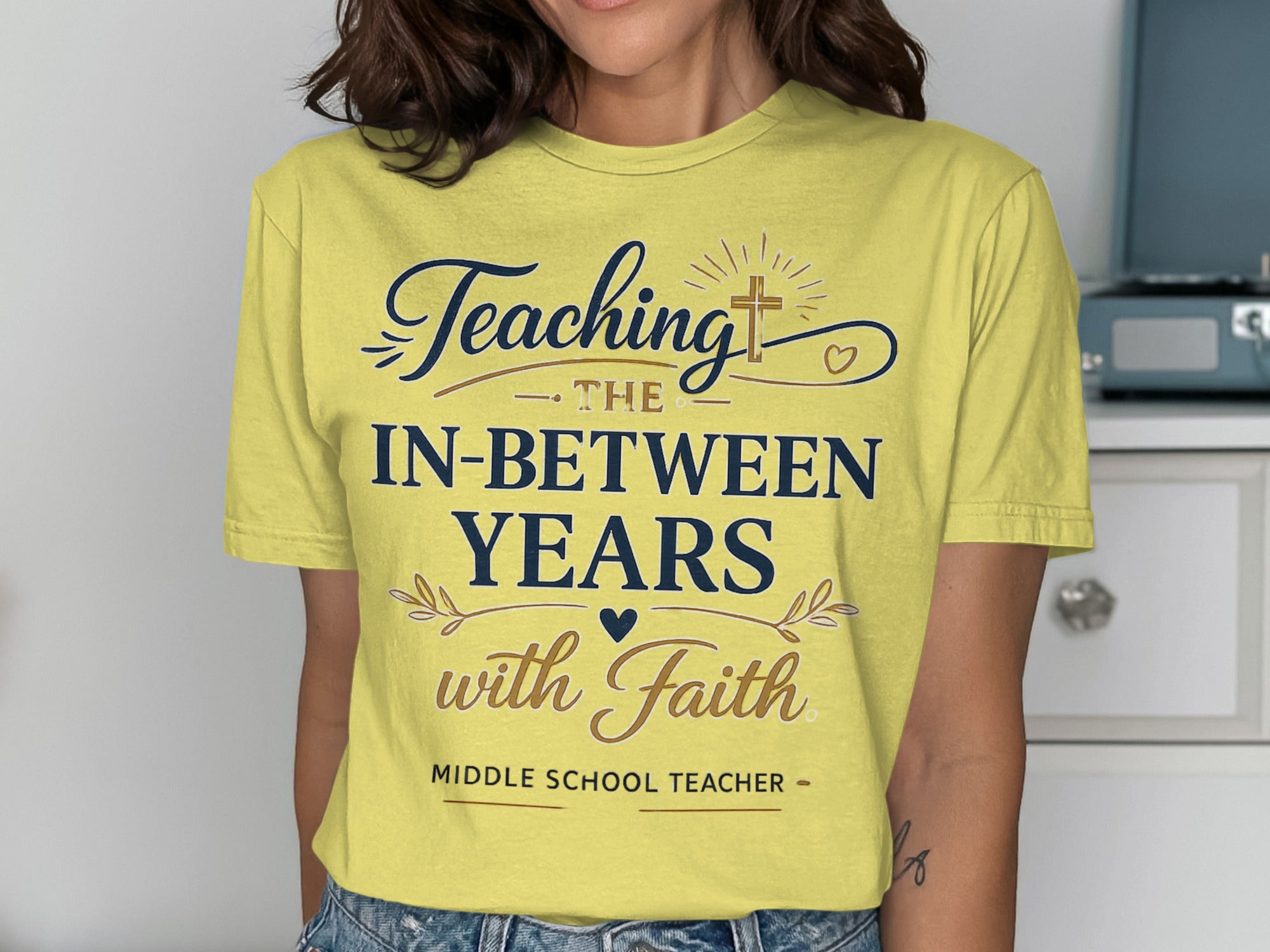 Yellow t-shirt with "Teaching the In-Between Years with Faith" and "Middle School Teacher" text.