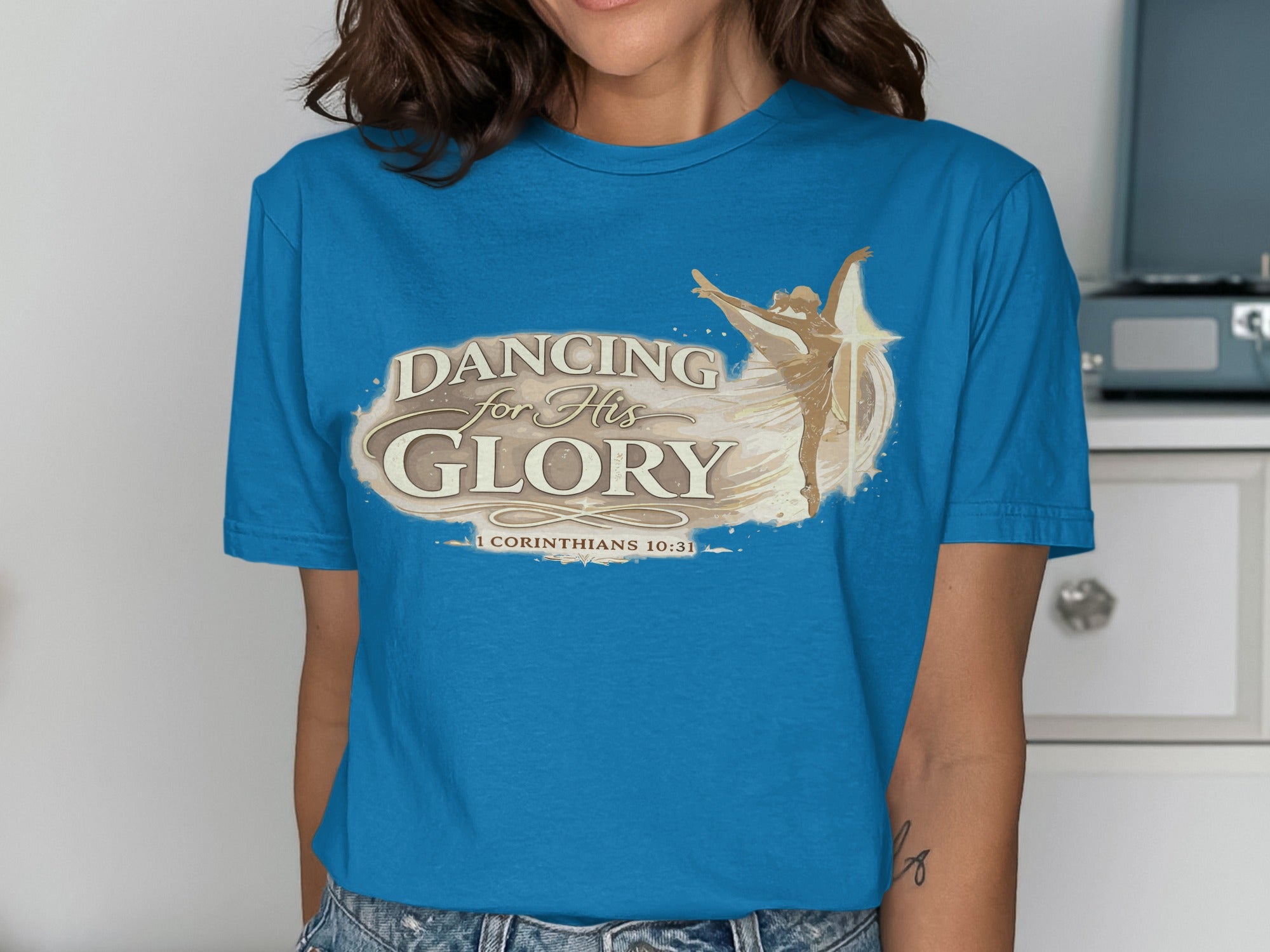 Blue t-shirt with "Dancing for His Glory" and dancer silhouette, Philippians 4:13 text.