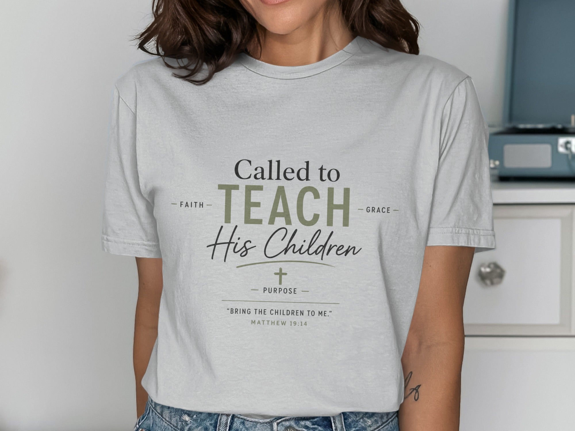 Grey t-shirt with "Called to TEACH His Children" and Bible verse.