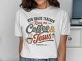White t-shirt with "6th Grade Teacher Runs on Coffee & Jesus" and Hebrews 13:5.