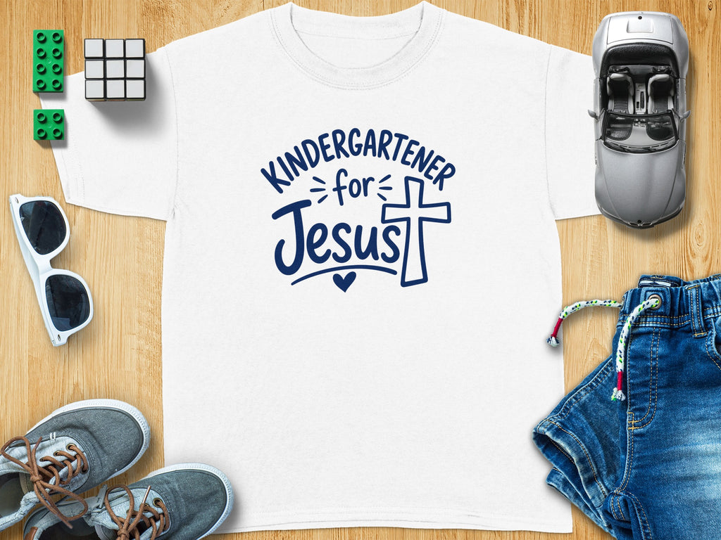 White t-shirt with "Kindergartener for Jesus" graphic and a cross.