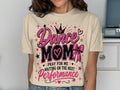 Tan t-shirt with "Dance Mom" text, crown, heart, and bow graphics.