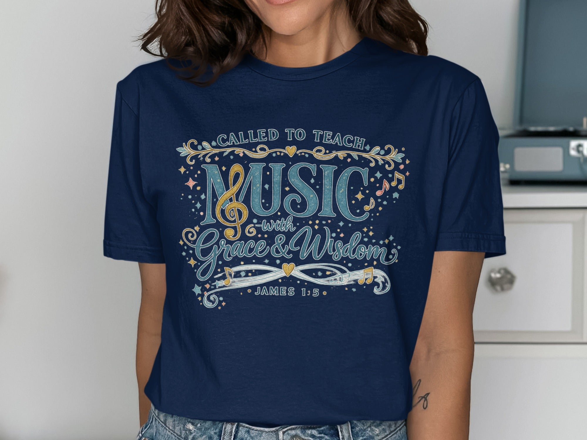 Navy t-shirt with "Called to Teach Music with Grace & Wisdom" and Bible verse.
