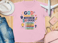 Pink t-shirt with "God Made Me Ready for 1st Grade" and a checklist.