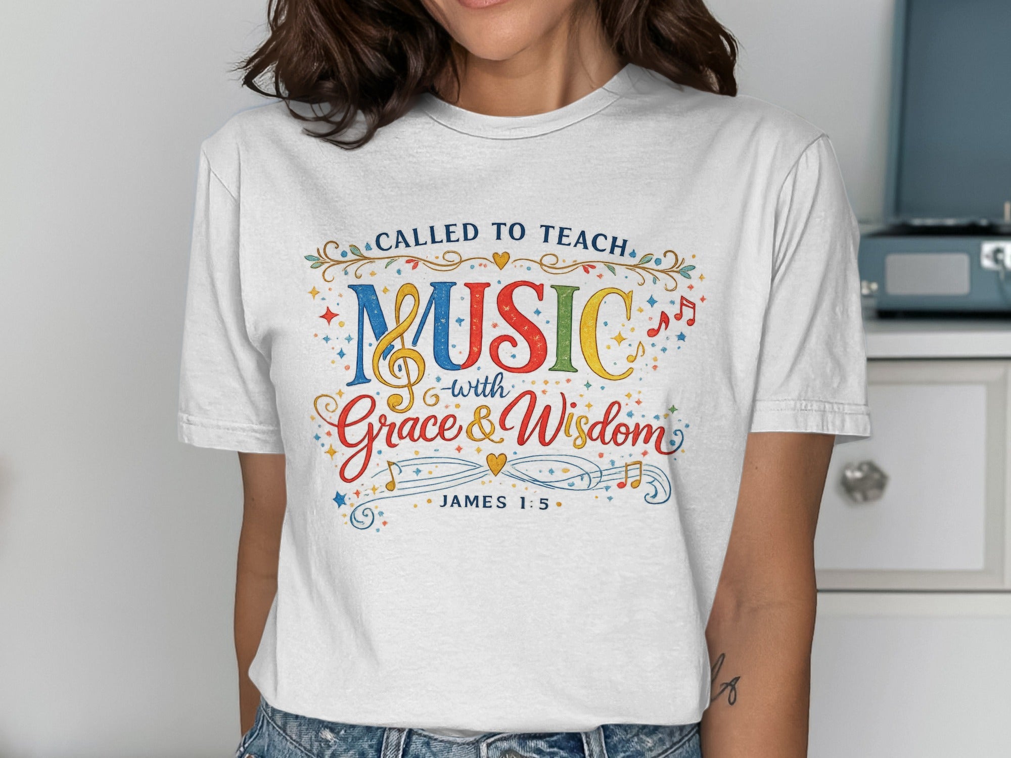 T-shirt with "Called to Teach Music with Grace & Wisdom" and James 1:5.